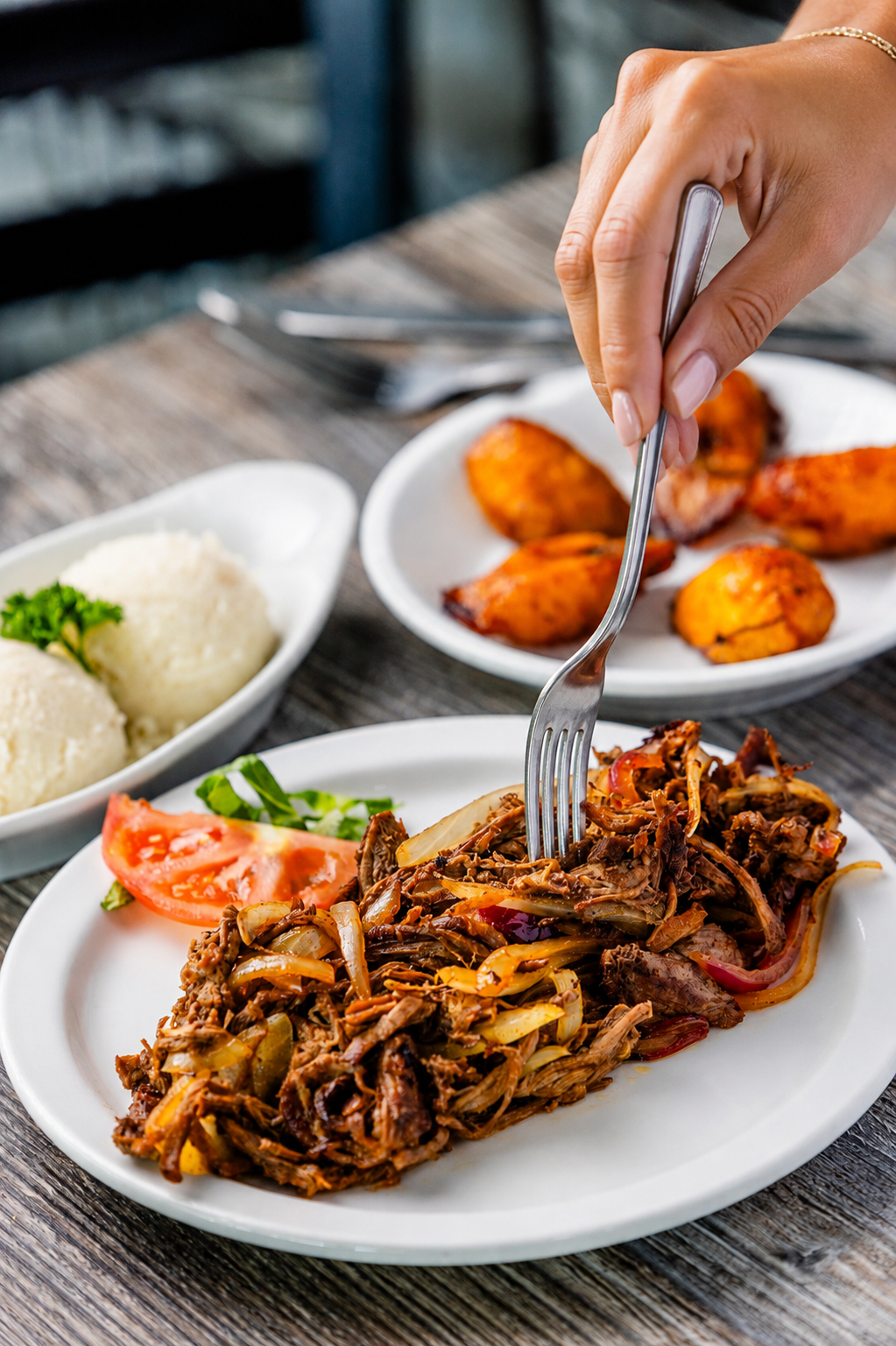 Authentic Cuban restaurant in Miami serving traditional ropa vieja, lechón asado & mojitos. Family recipes, vibrant atmosphere. Reserve your table today!