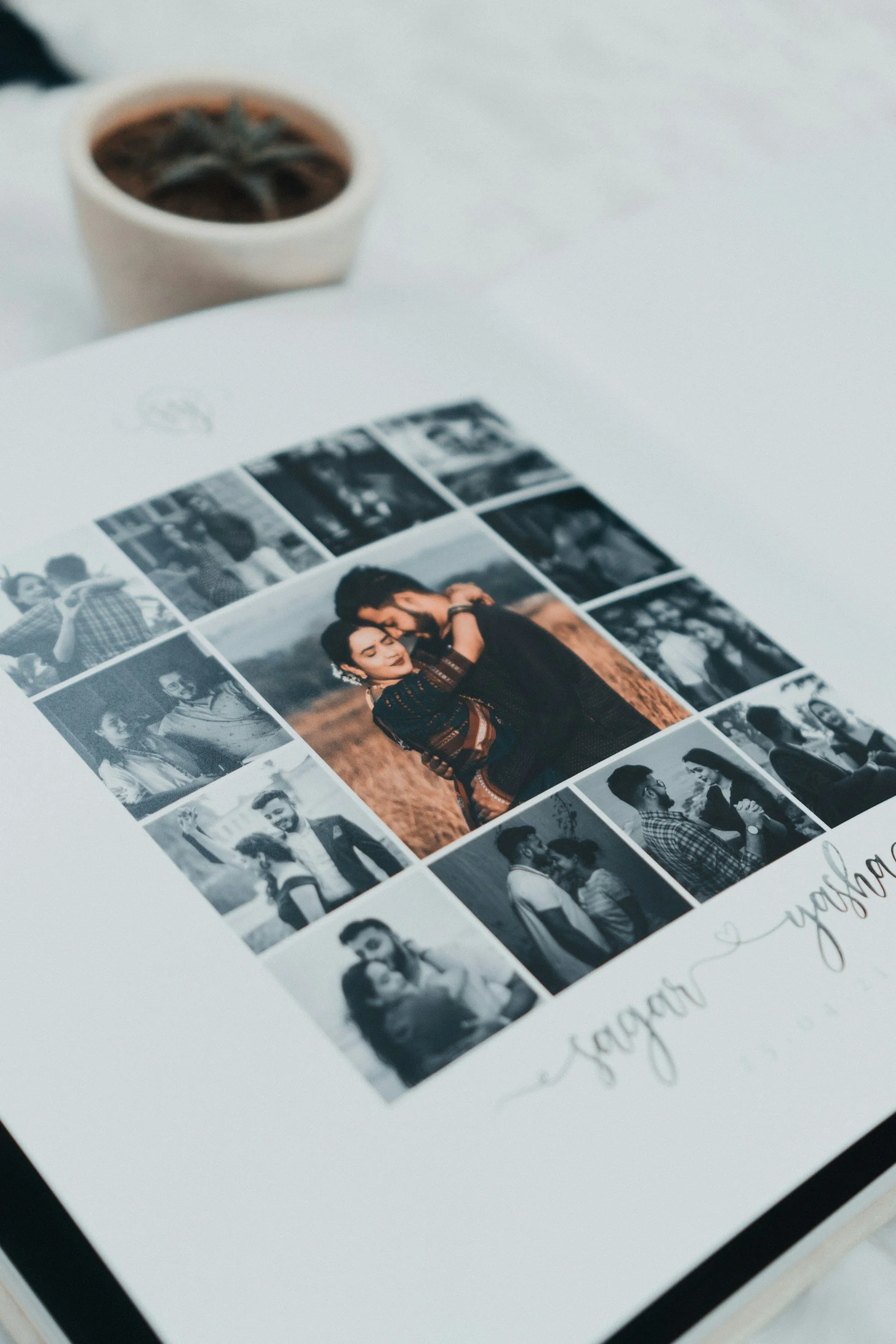 Printed photo collage featuring engagement and couples portraits arranged around a central color photograph.