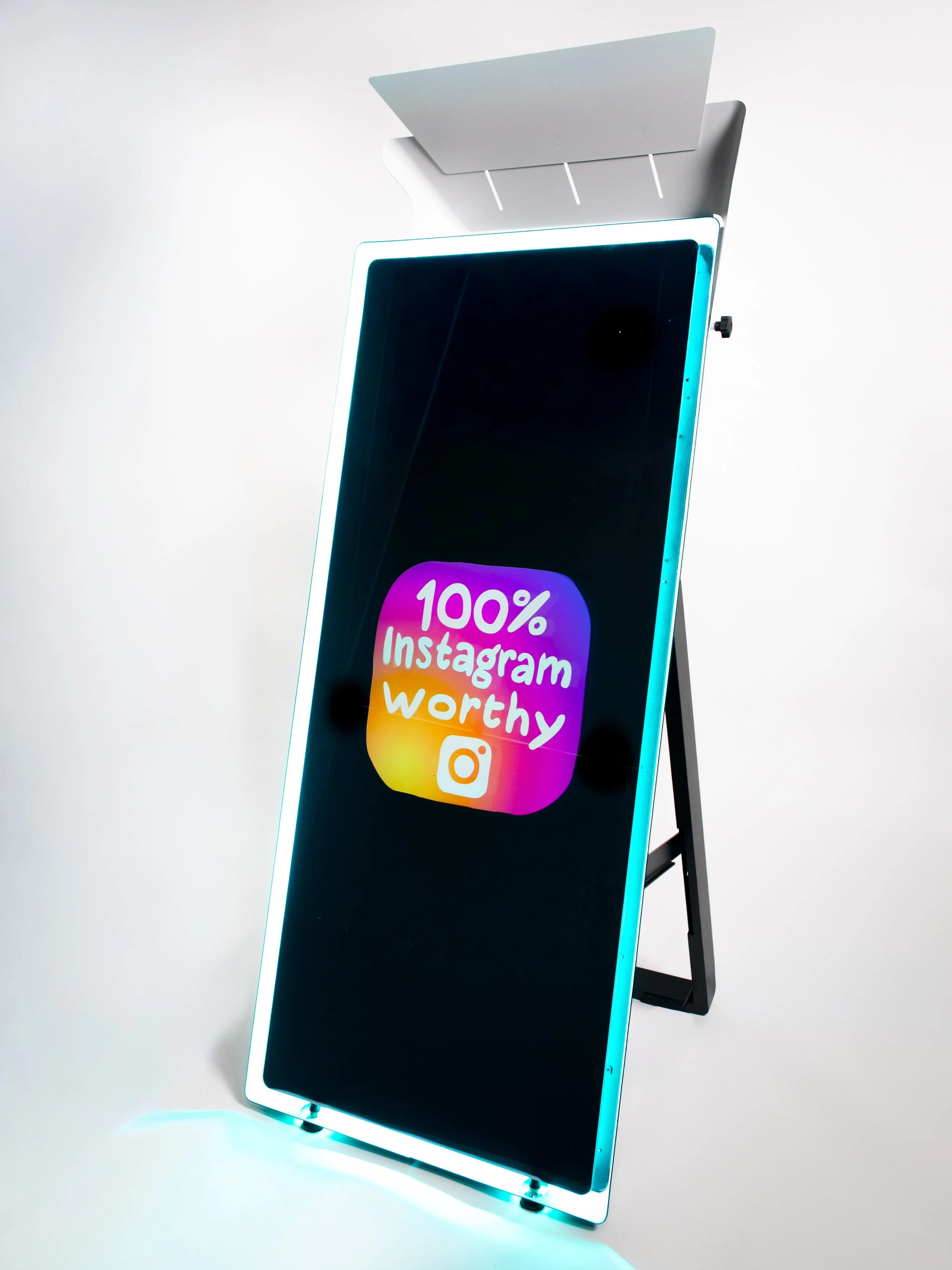 Digital photo booth display featuring a colorful “100% Instagram Worthy” graphic.