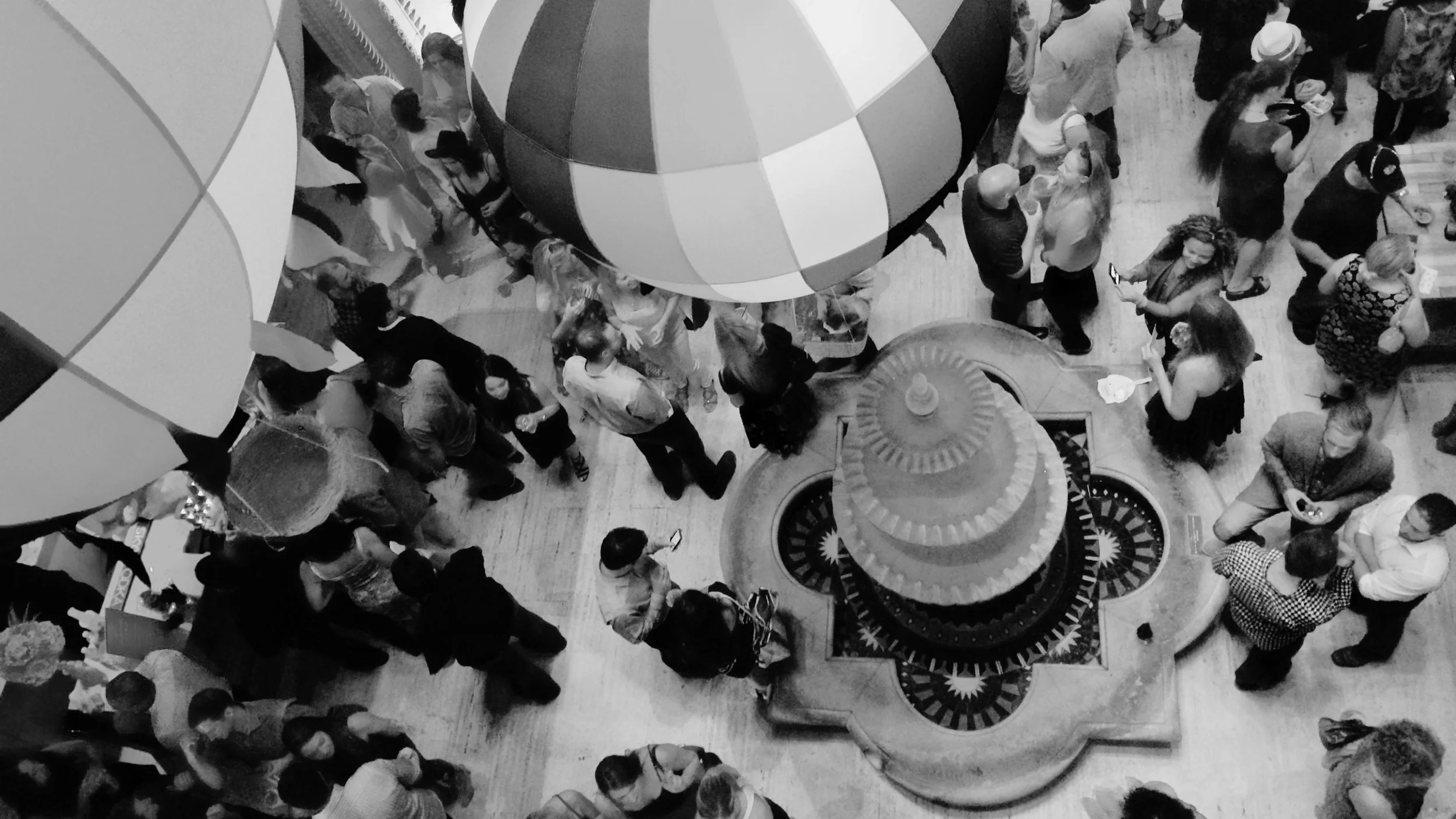 birdseye view of central rotunda, party full of people, black and white image