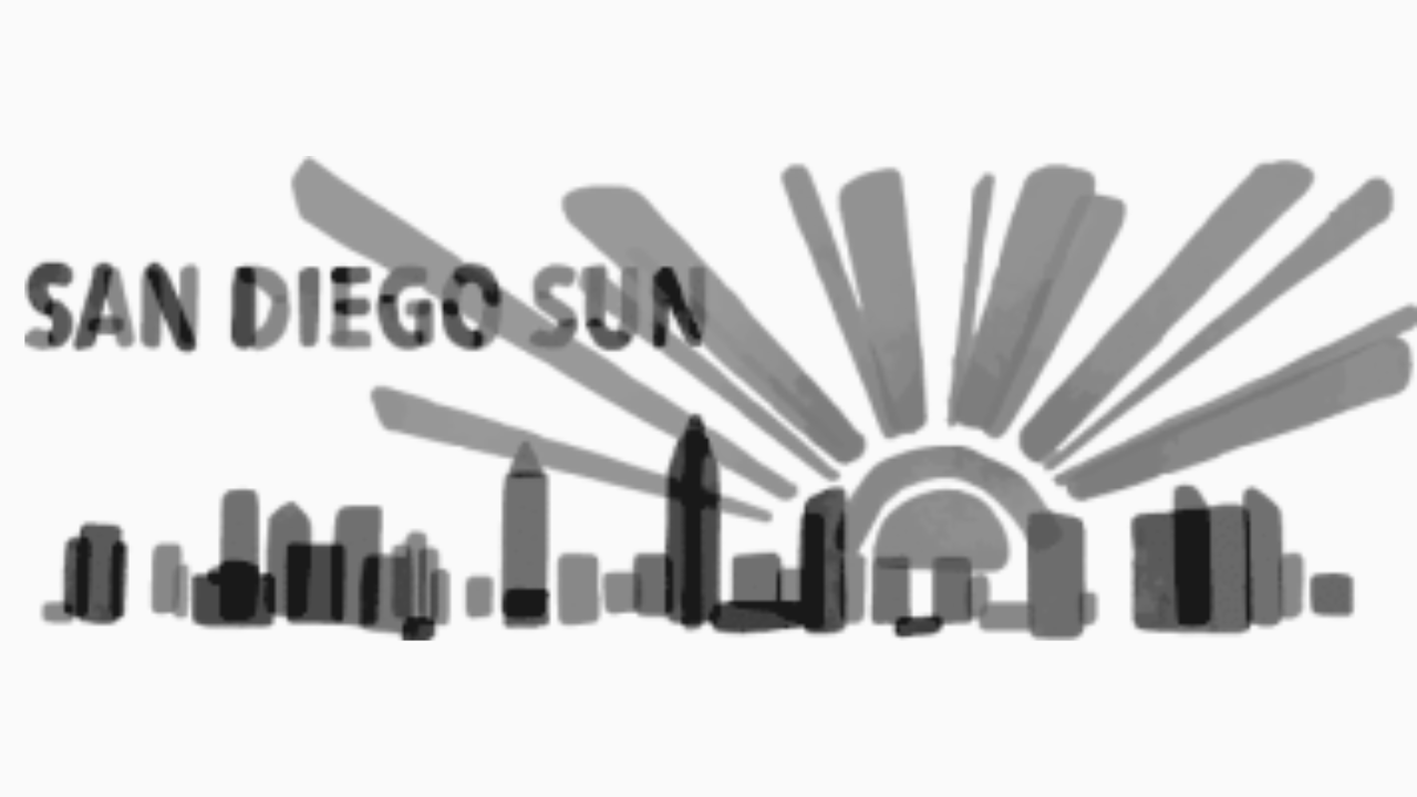 San Diego Sun newspaper logo featuring a city skyline silhouette.