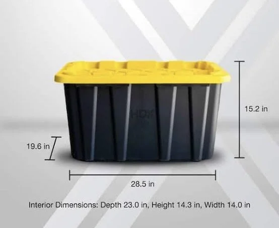 A black storage container with a yellow lid, measuring 28.5 inches in length, 19.6 inches in width, and 15.2 inches in height, with interior dimensions of 23 inches deep, 14 inches wide, and 14.3 inches high.