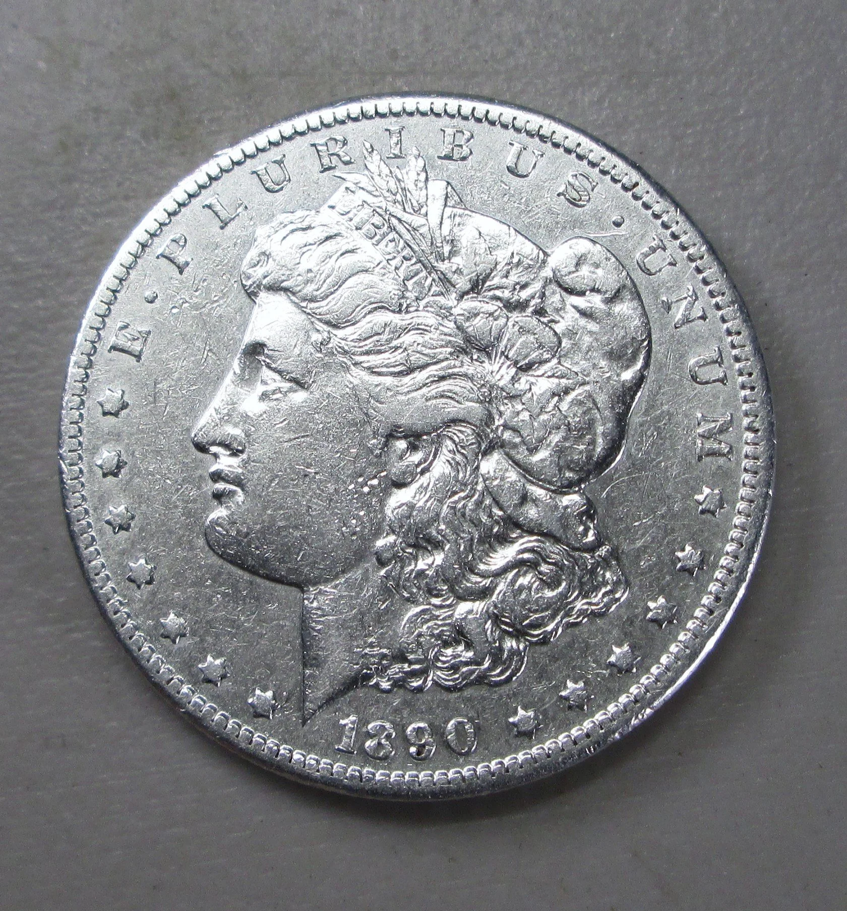 1890 CC Morgan Dollar Almost Uncirculated