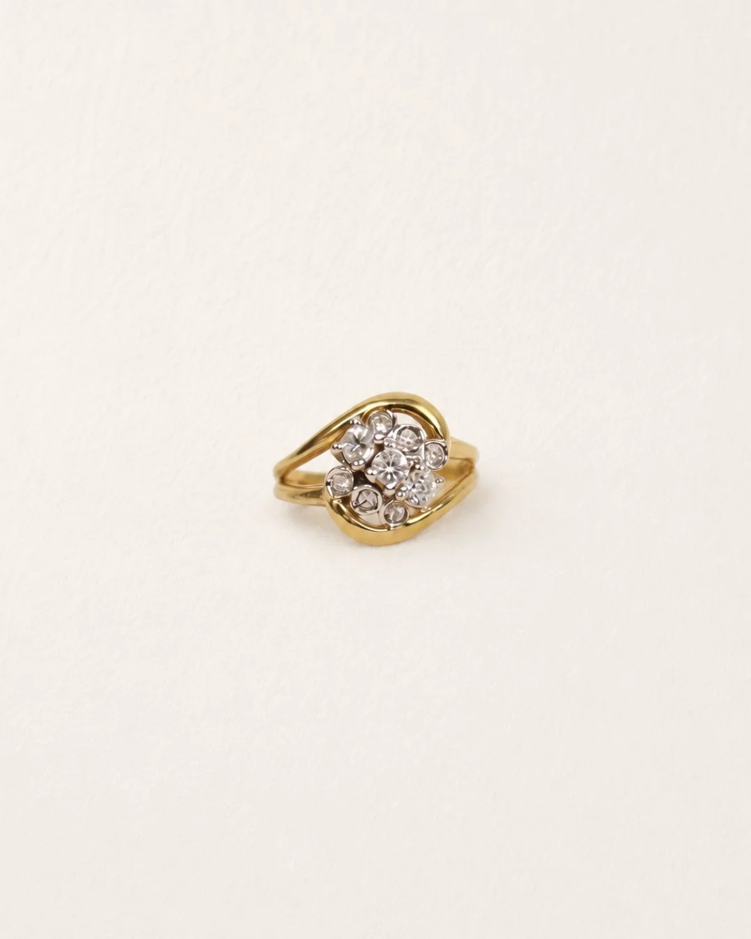 Vintage gold diamond cluster ring, front view showing the leaf-shaped pave setting