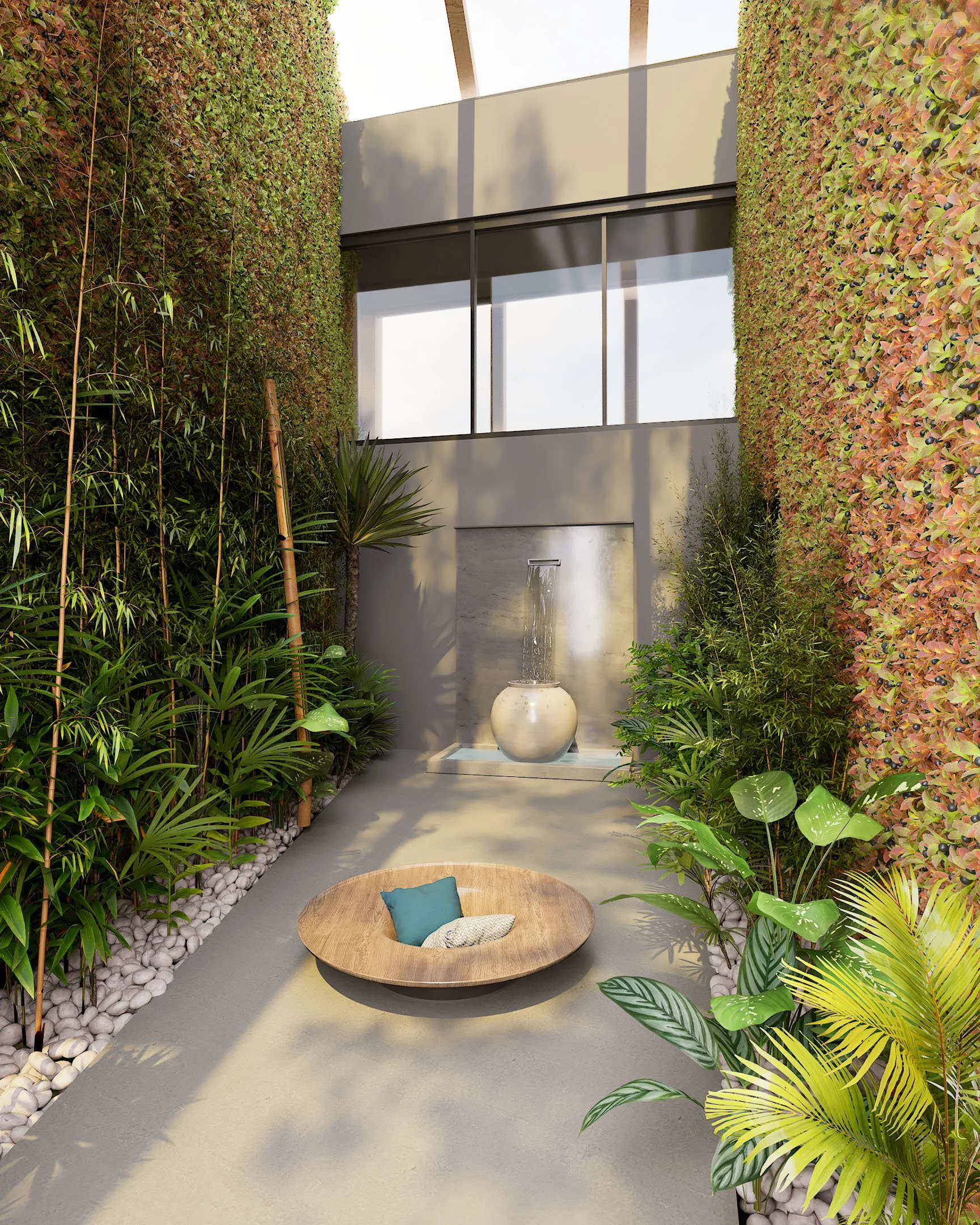 Indoor space featuring a water fountain in front of large windows, with tall, lush green and colorful foliage walls on either side and a round wooden seating area with cushions in the foreground.
