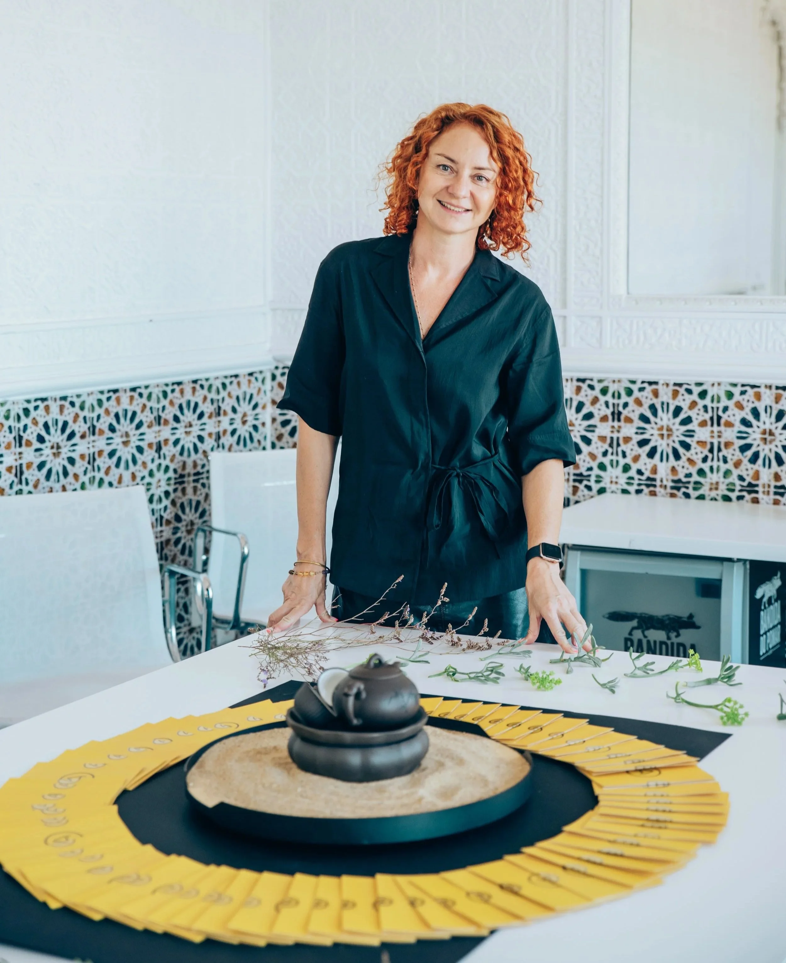Kate Shifman presenting an art installation on the Japanese concept "Ma" and AOMA Coliving at an event in Lisbon