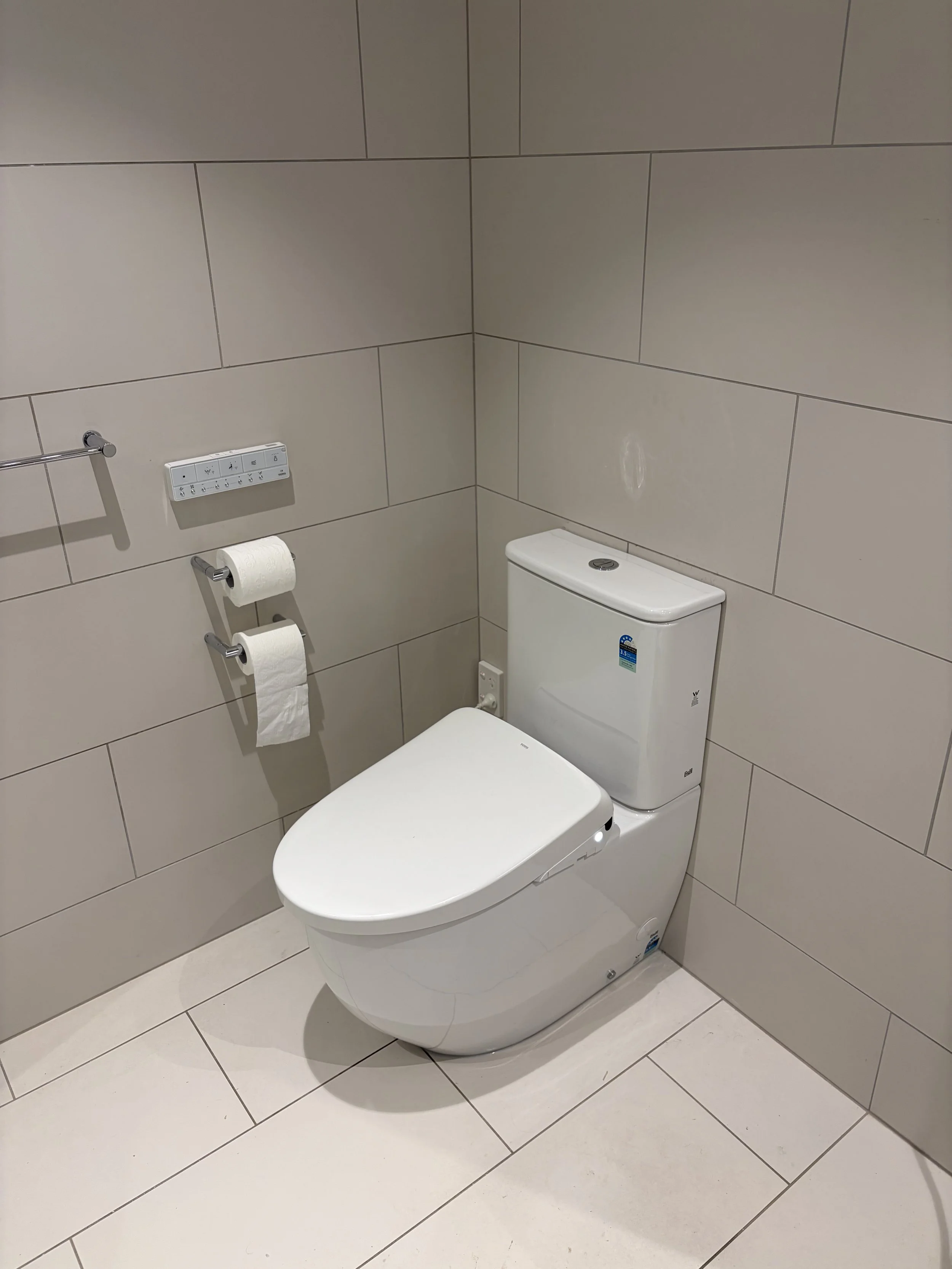Install of an electric toilet seat / bidet control panel.