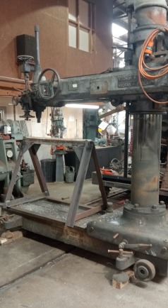 Setting up to drill new holes into saddle tank