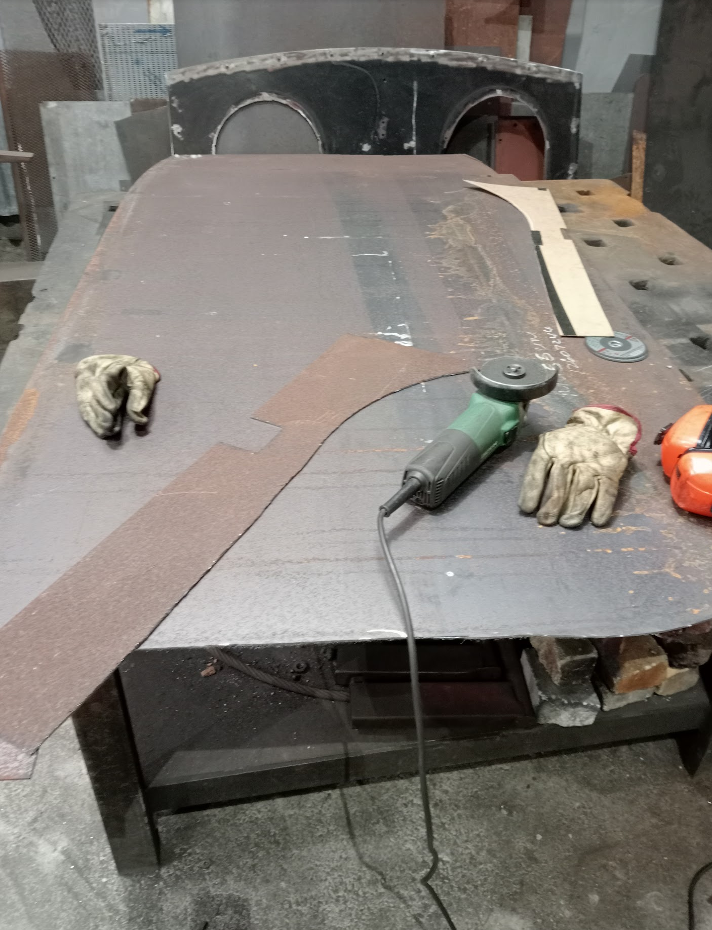 Fabricating a cab panel.