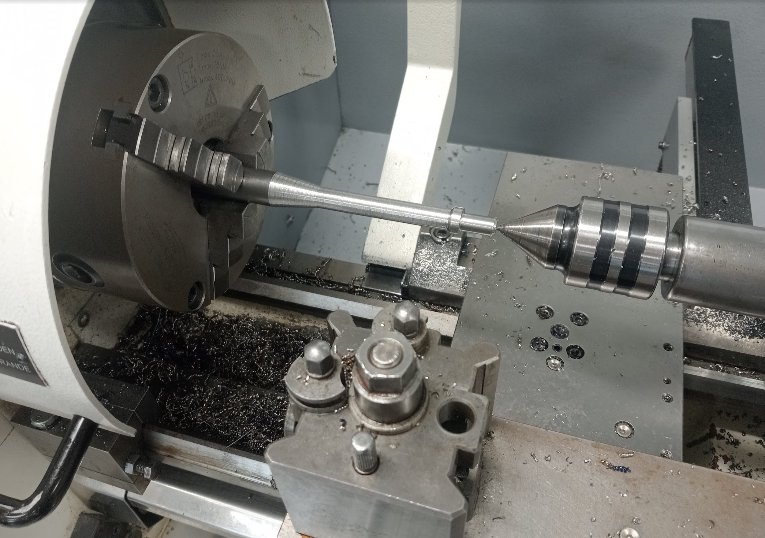 Turning the body of the welding hammer.