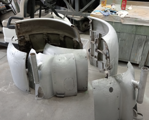 Assembling engine cowling.