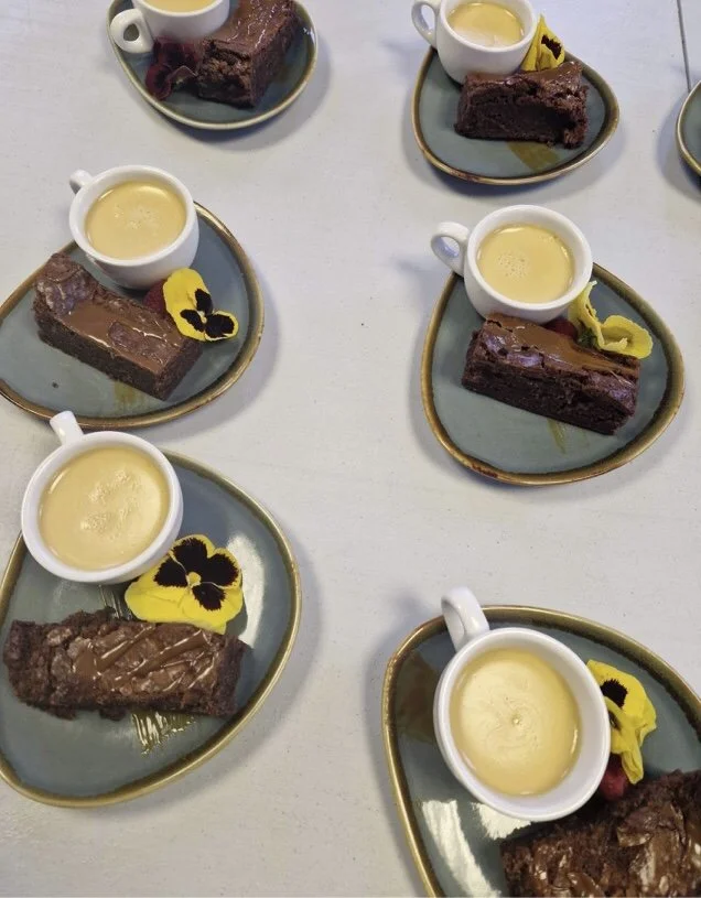 Duo of desserts:- Mini Bailey Panna Cotta served with Brownie