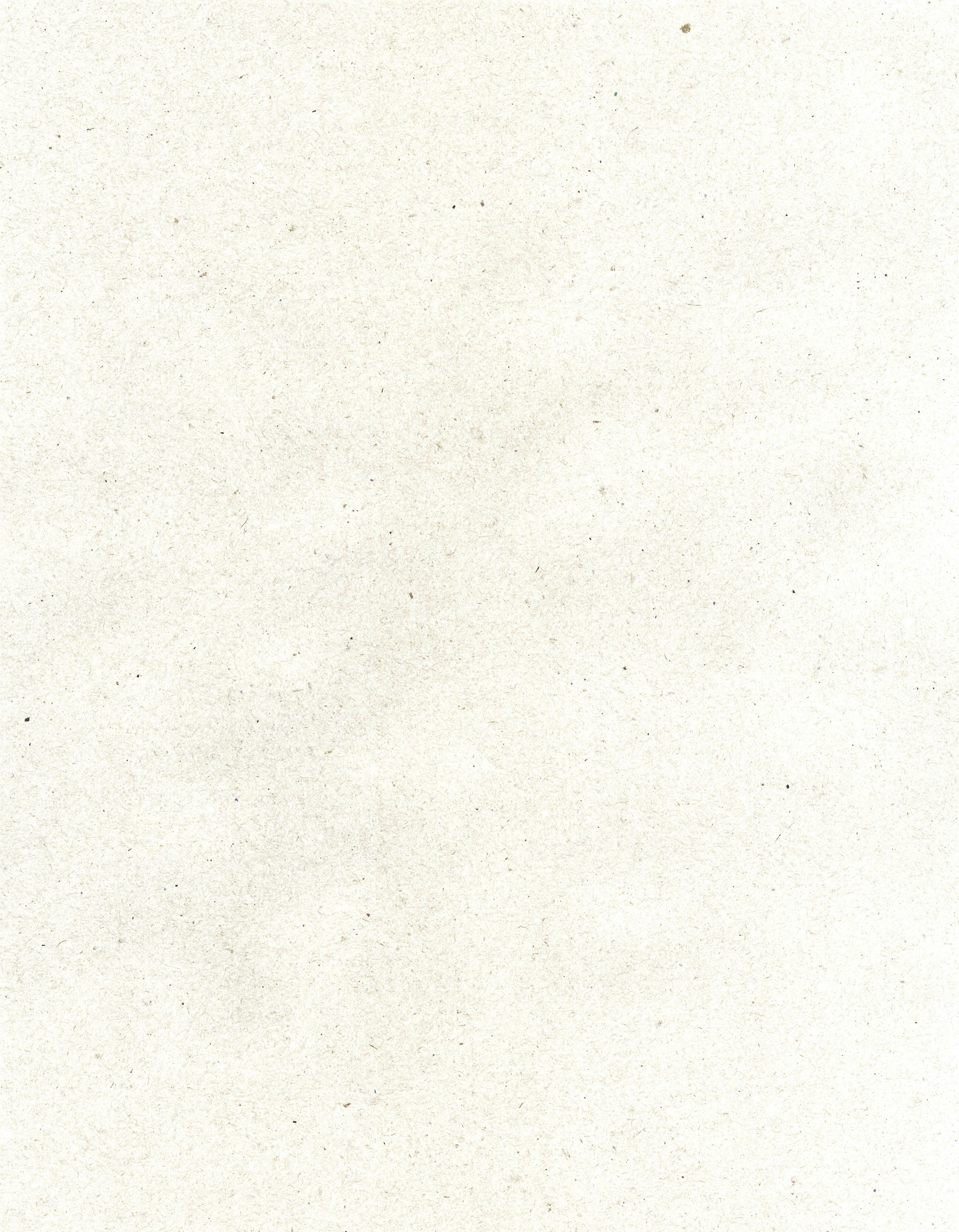 Close-up of a piece of paper with a slight texture and small bumps.