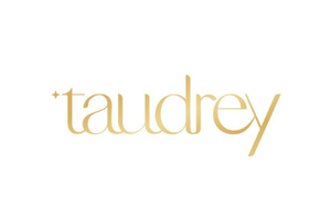 The word 'taudrey' written in gold font with a small star above the 't'.