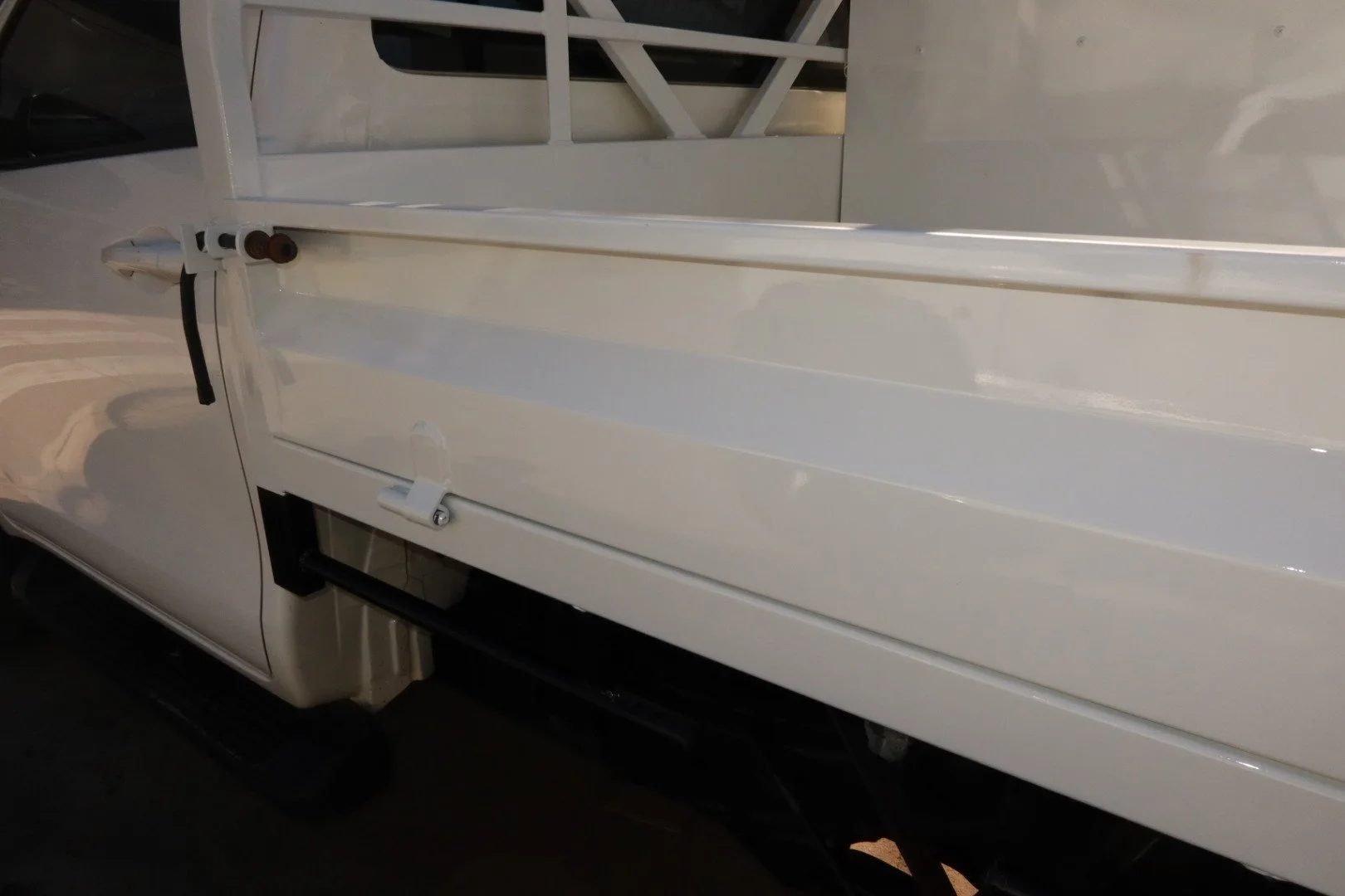 After repair – restored and refinished white commercial vehicle tray