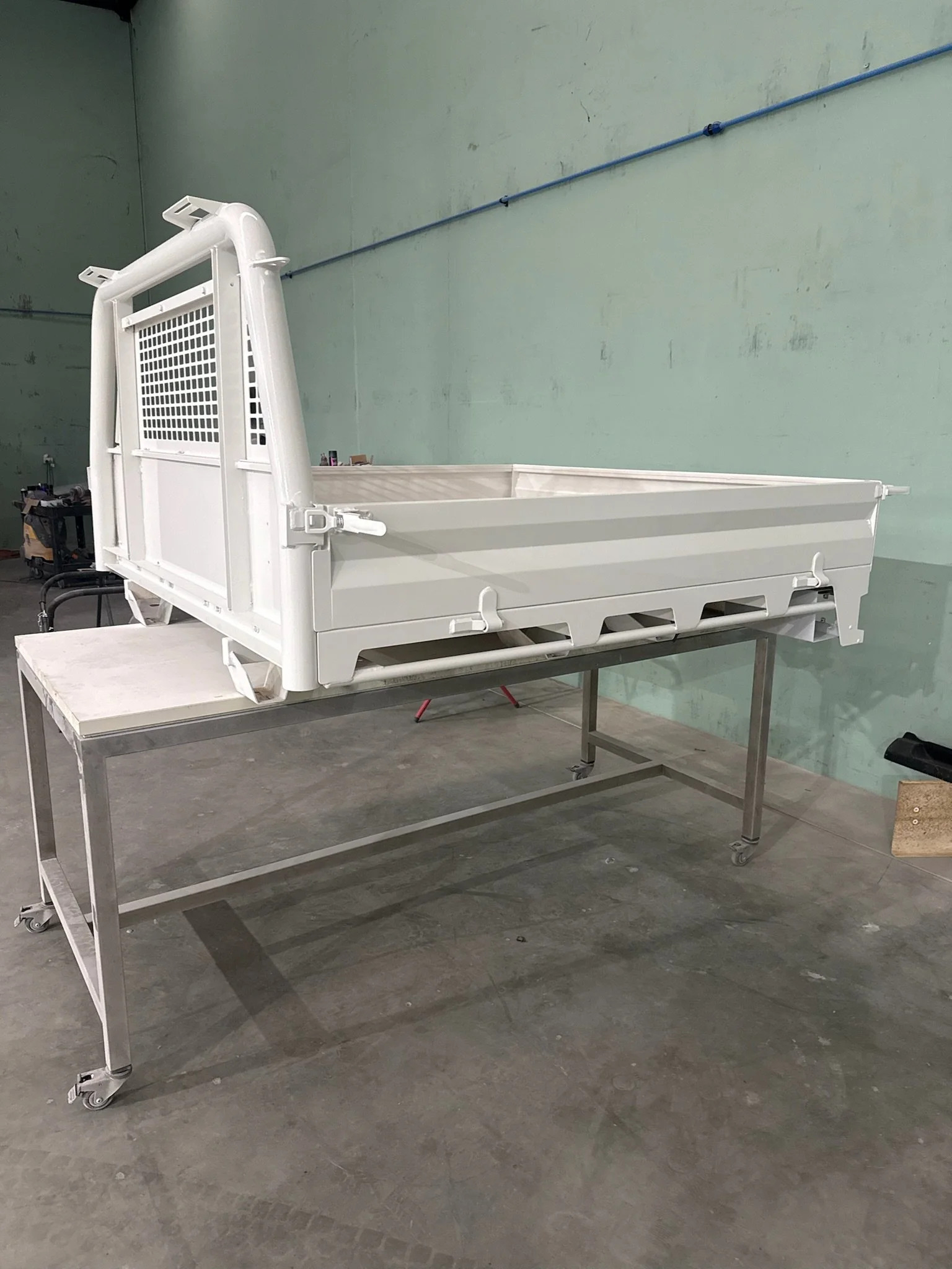 Commercial vehicle tray professionally repaired and refinished