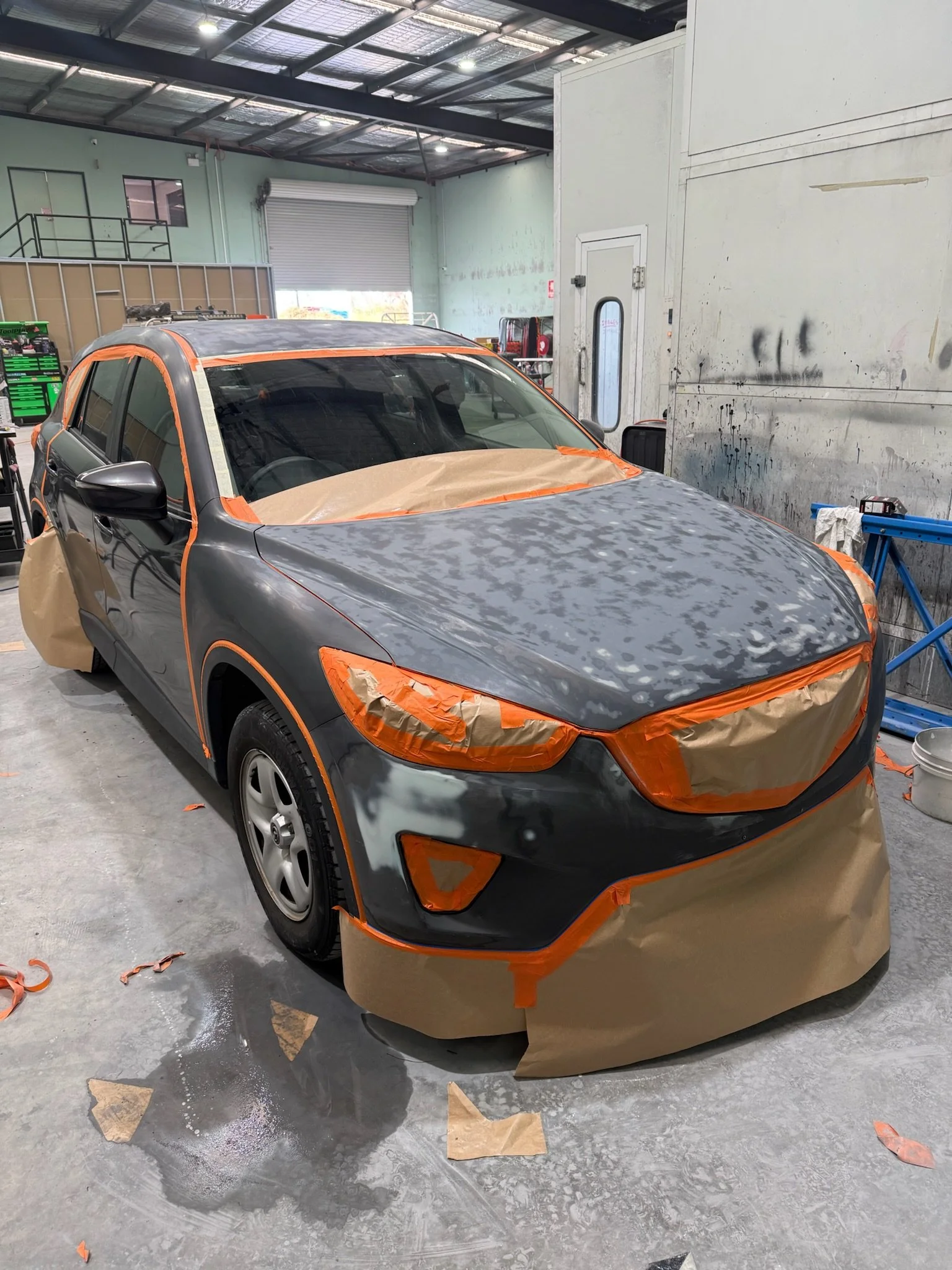Vehicle bonnet and front panels prepared for automotive refinishing