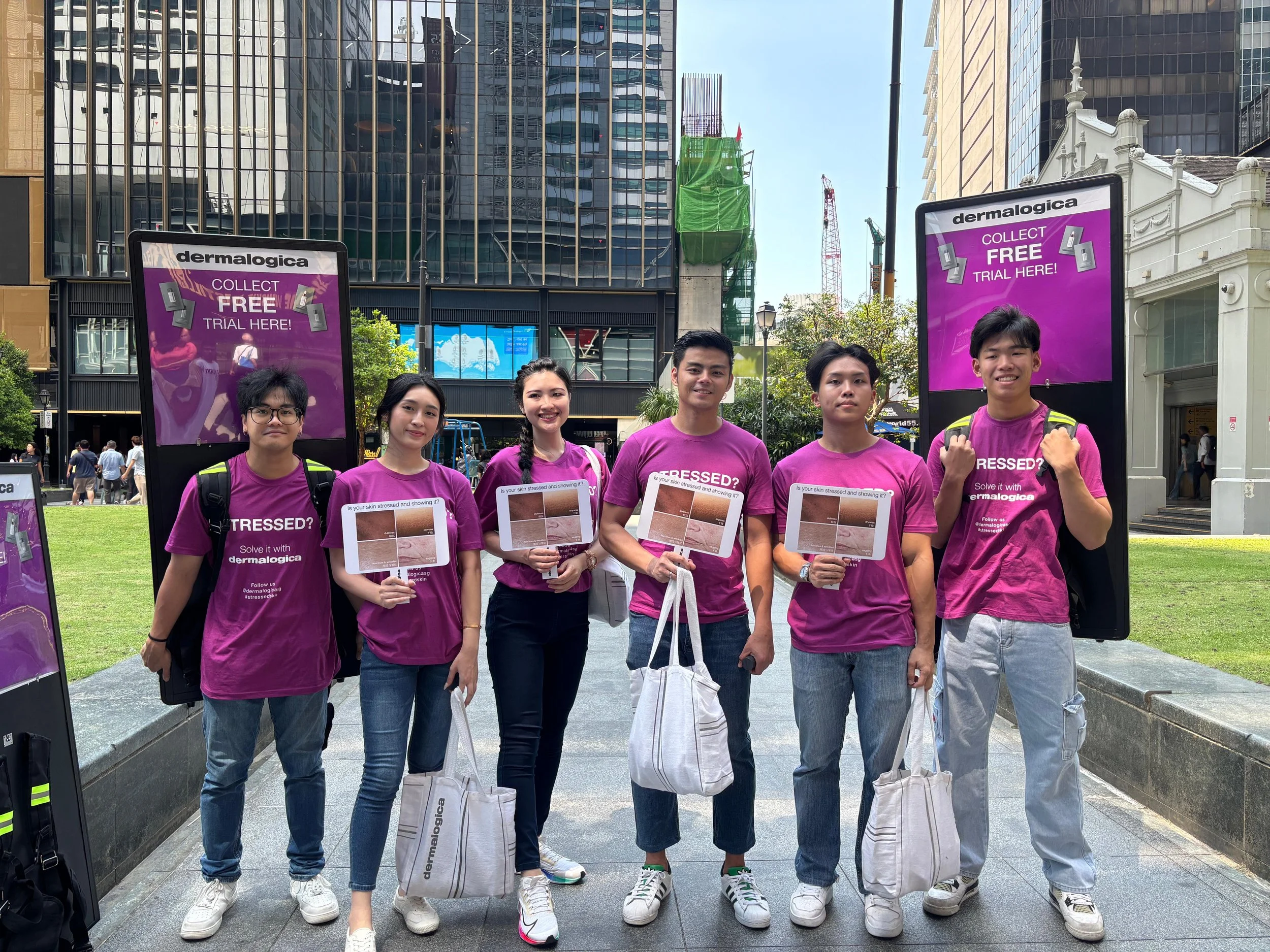 Anticipatingdiva promotional team supporting a Dermalogica outdoor brand activation in Singapore.