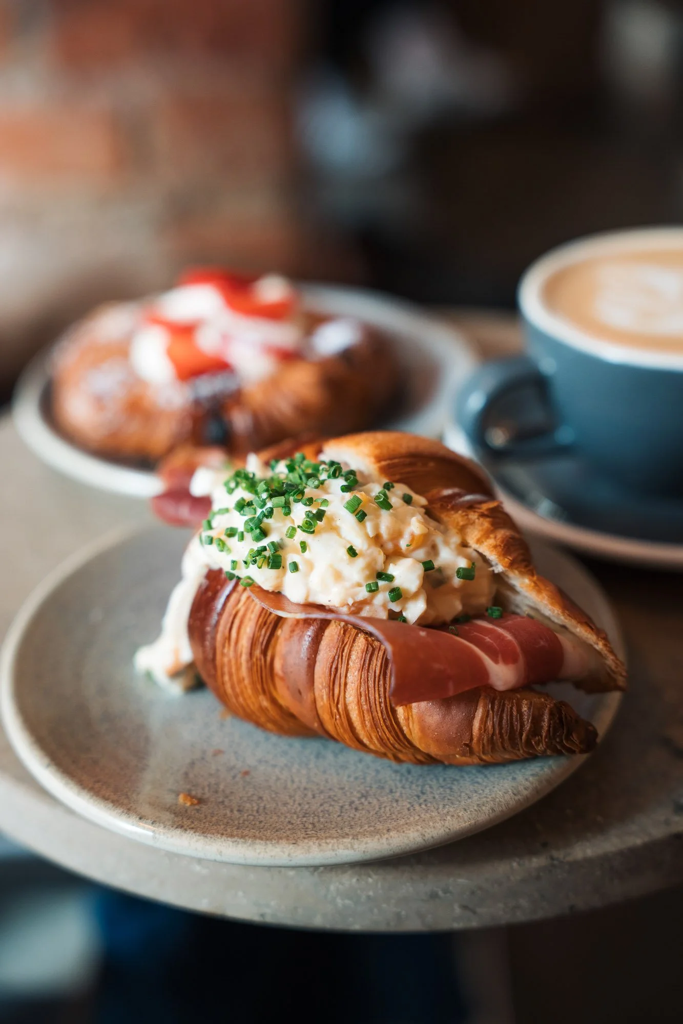 filled croissant from cafe in Stockholm. commercial photography