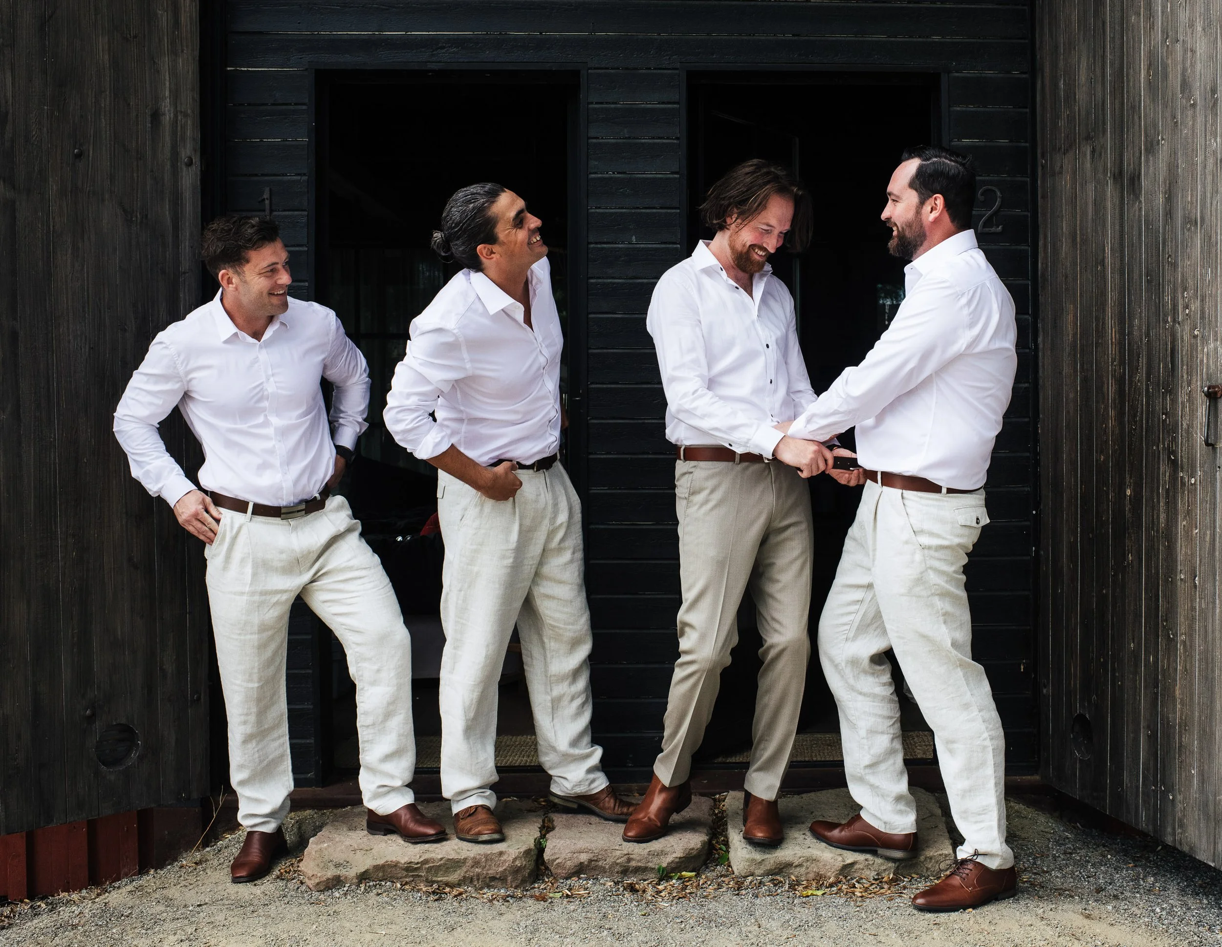 groomsmen having fun on their wedding day in Stockholm, Sweden