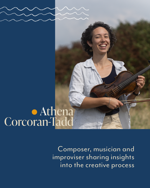 A woman with short curly hair smiling and holding a violin and bow outdoors with a background of trees and sky.
