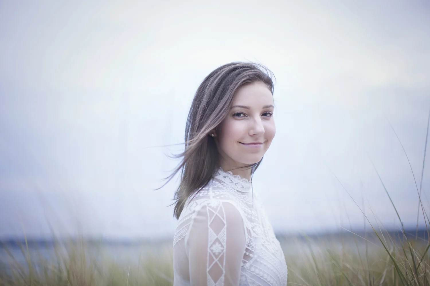 Natural light portrait in Sleeping Bear Dunes beach grass.