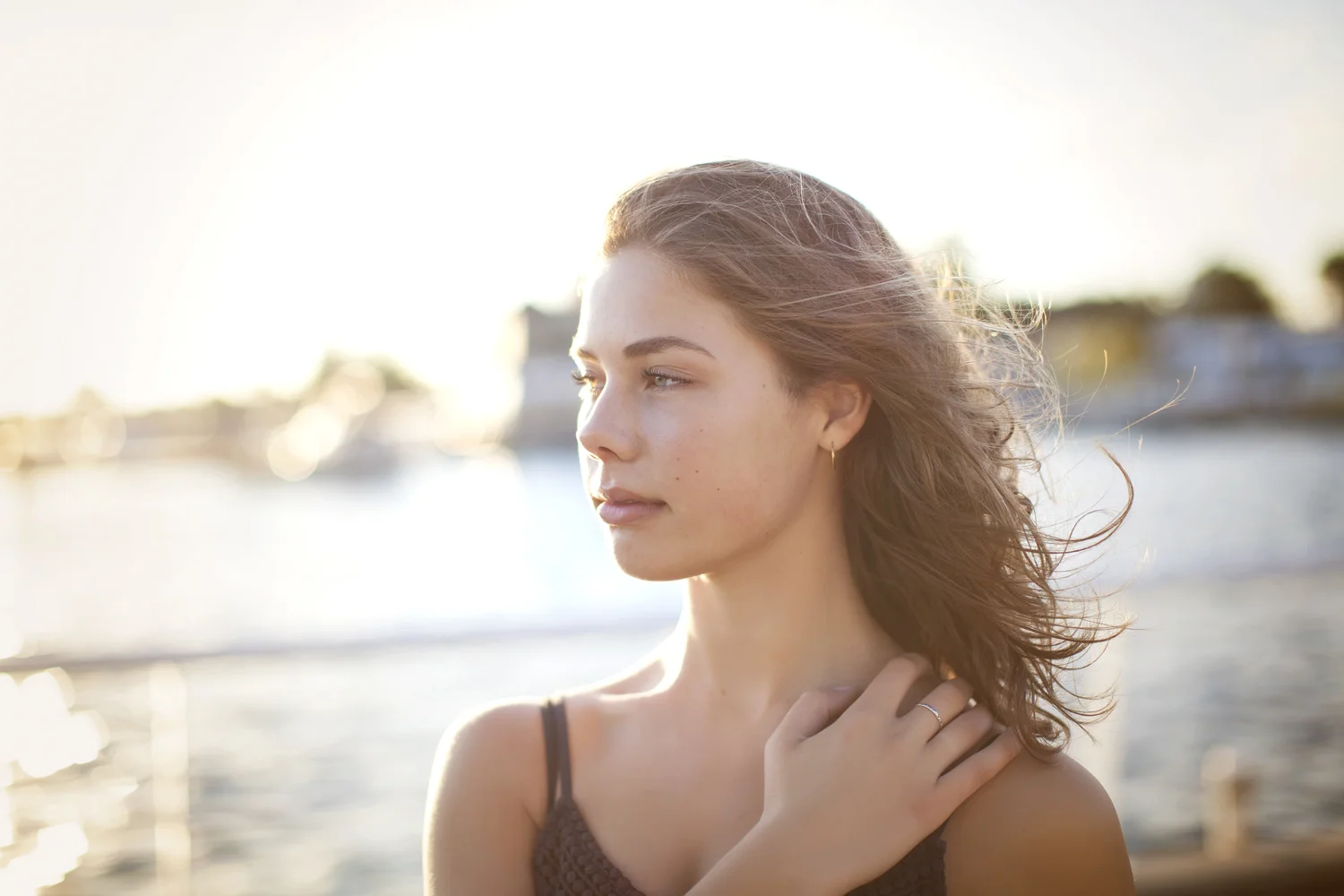 Natural light portrait beside Grand Traverse Bay.