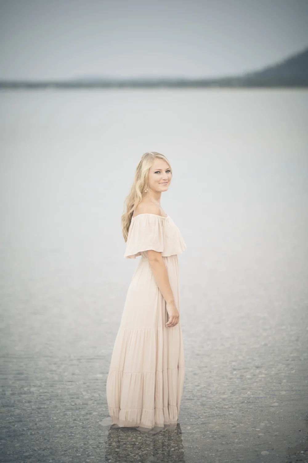 Fine art portrait standing in Lake Michigan.
