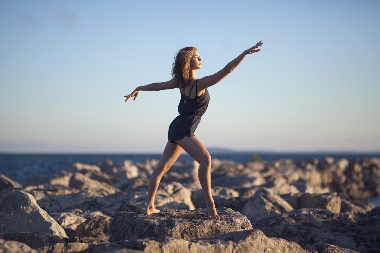 Dance portrait on Lake Michigan breakwater.