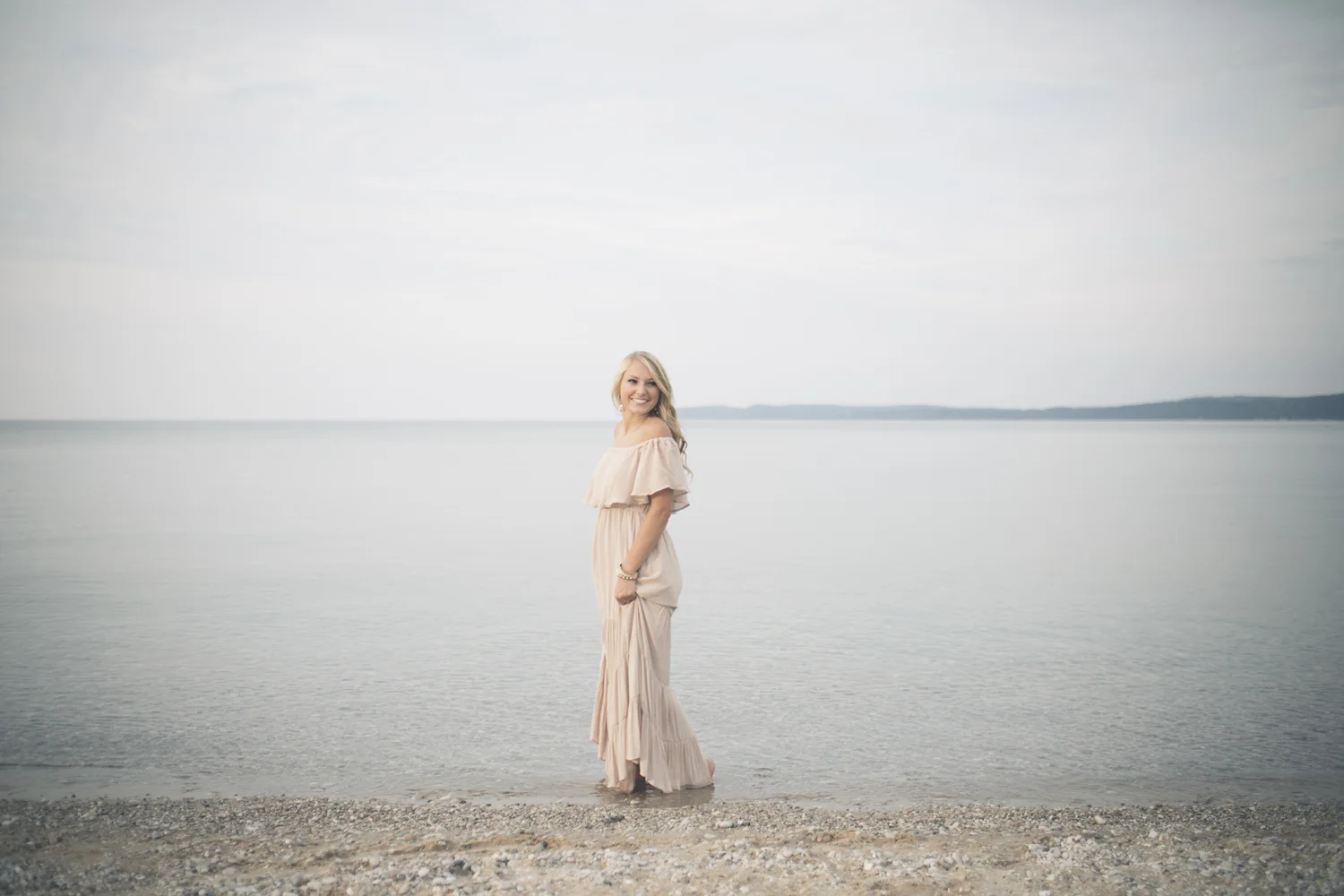 Fine art portrait standing in Lake Michigan at sunset.