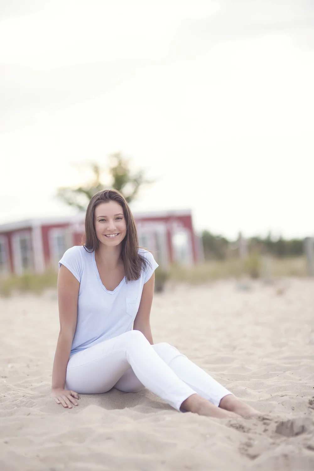 Lifestyle portrait on Lake Michigan beach.
