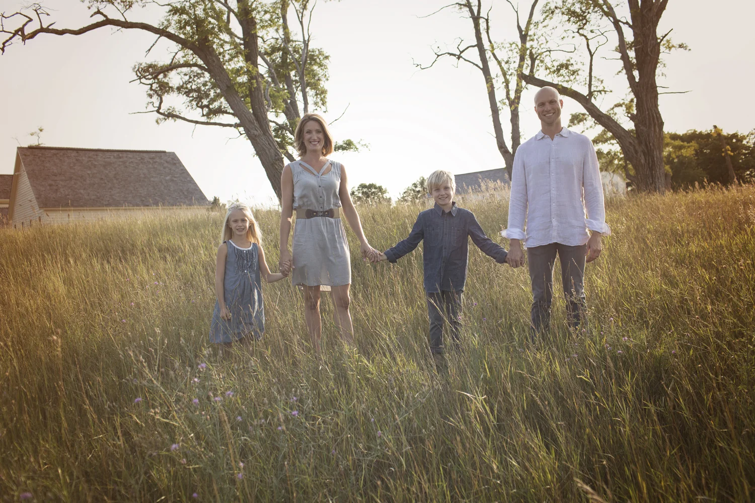 Family portrait in Northern Michigan meadow.