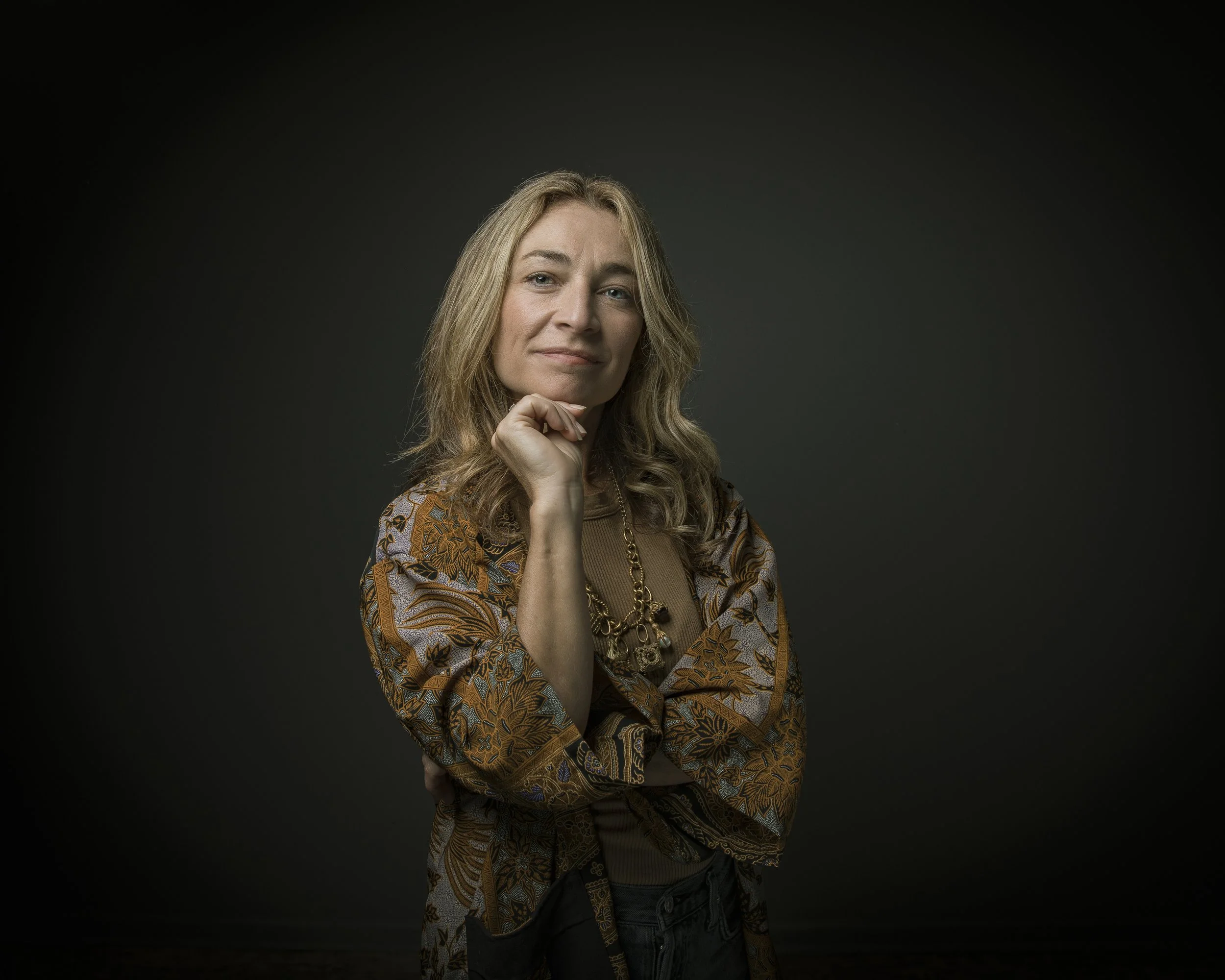 Confident portrait of woman in studio.