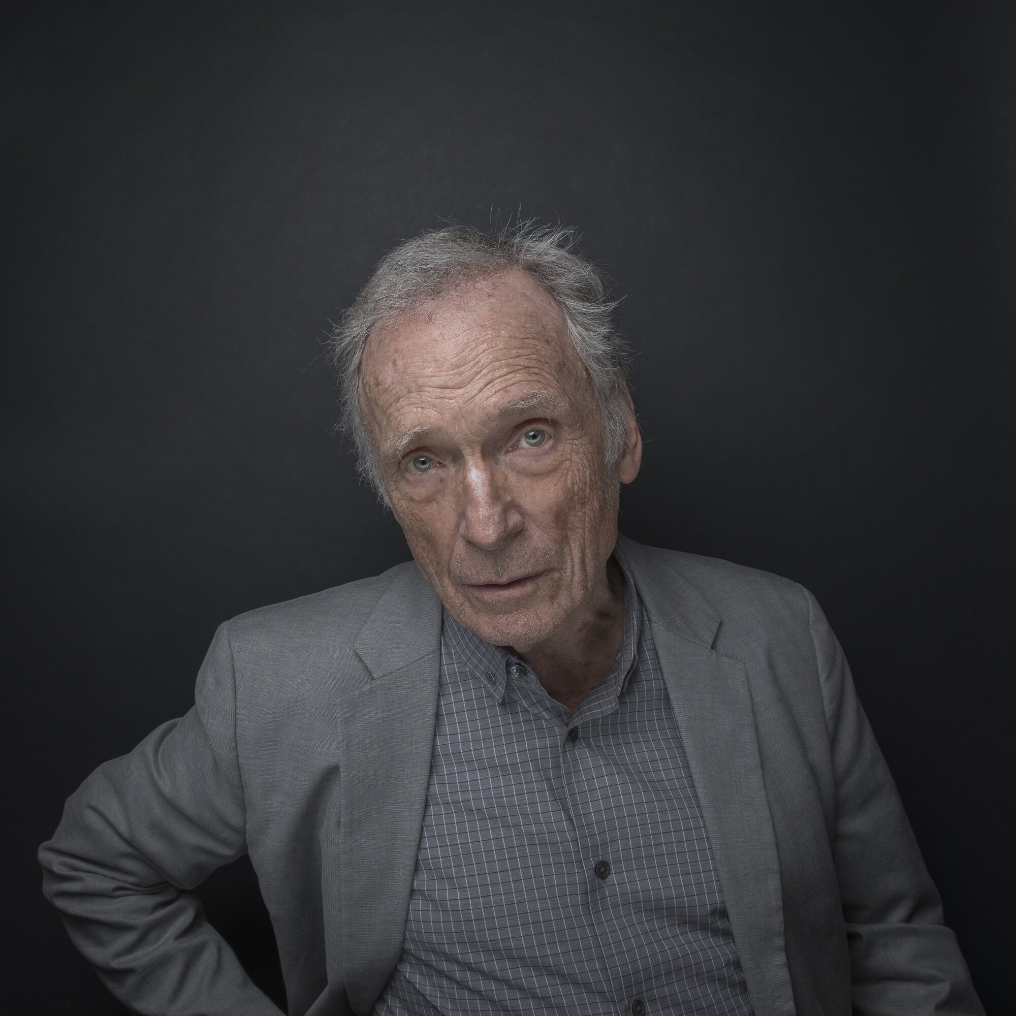 Studio portrait of television host Dick Cavett.