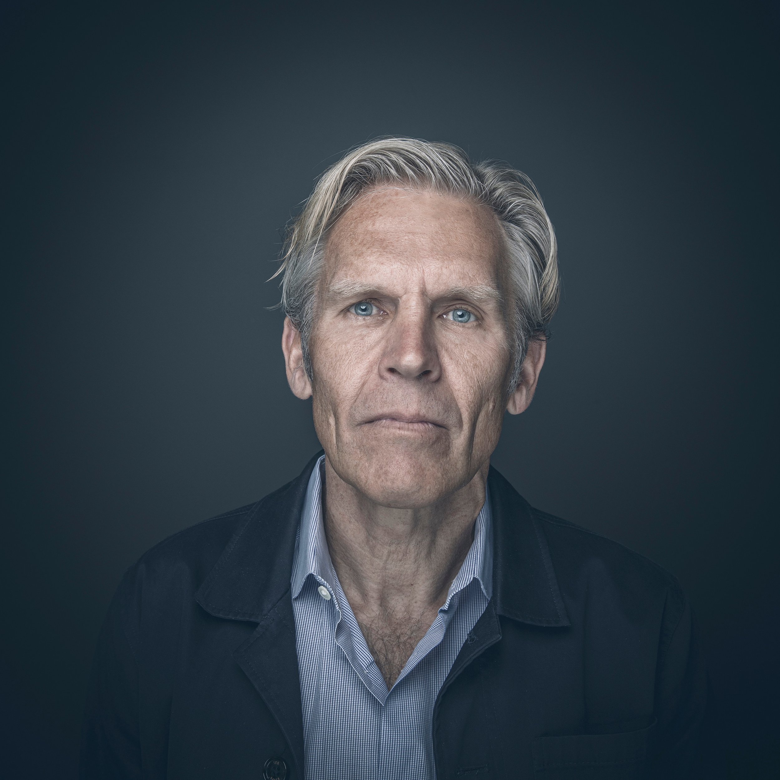 Editorial portrait of man photographed in studio.