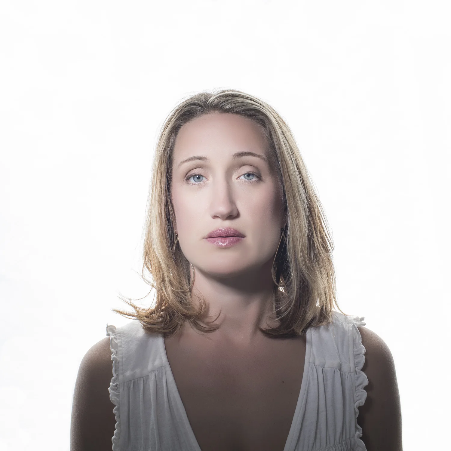High-key portrait of young woman.
