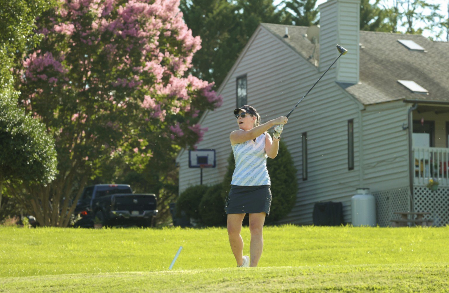 Coach Annette living life and golfing with friends.