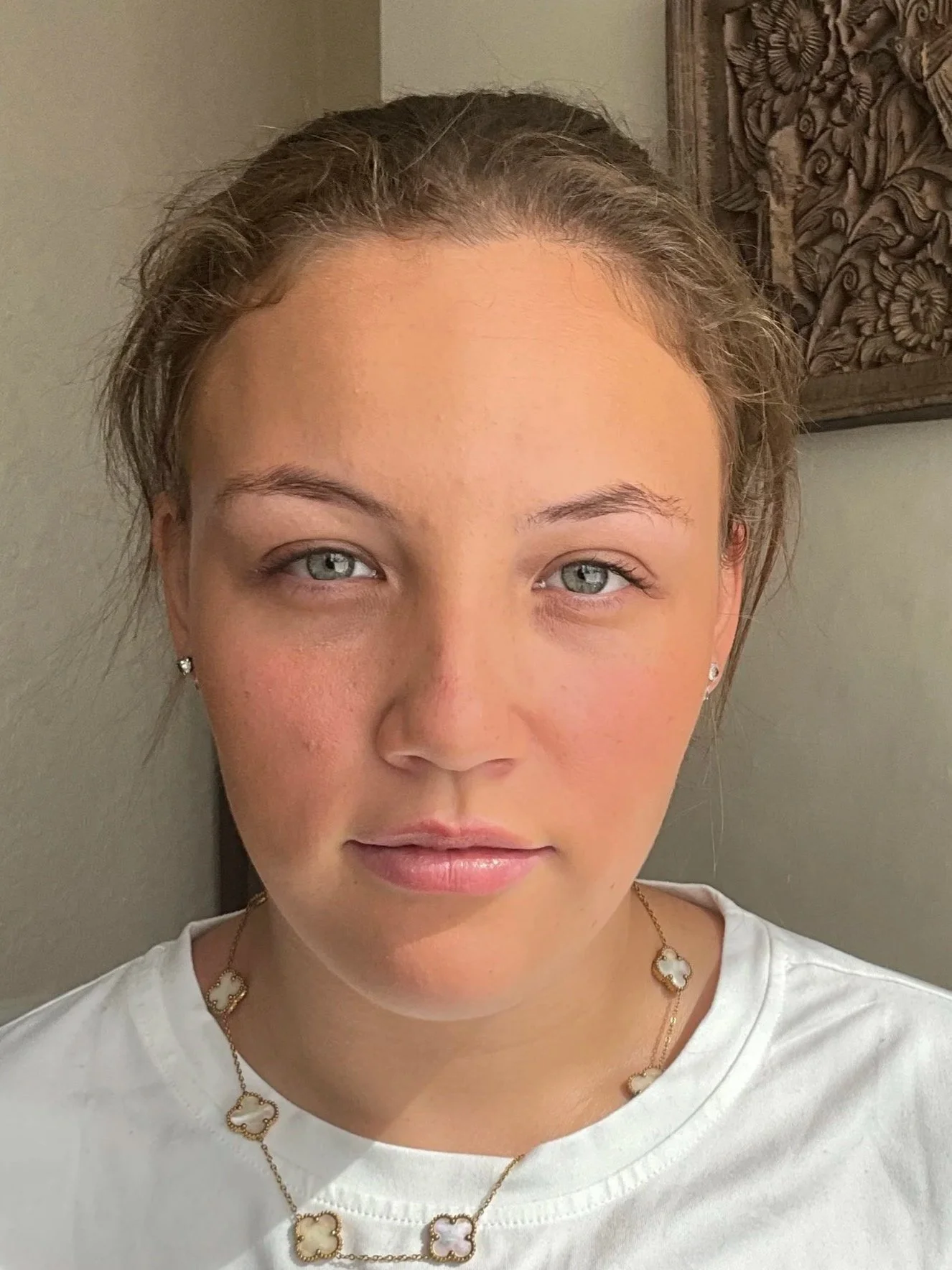 Close-up of a woman's face with  a natural makeup look