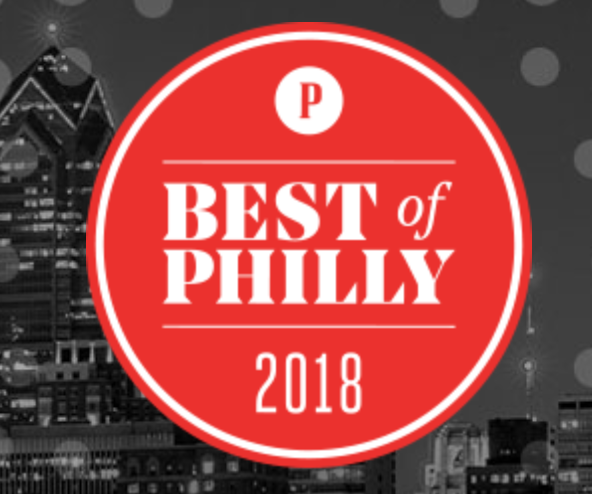 Red circular badge with white text that reads "Best of Philly 2018" over a black-and-white cityscape background.