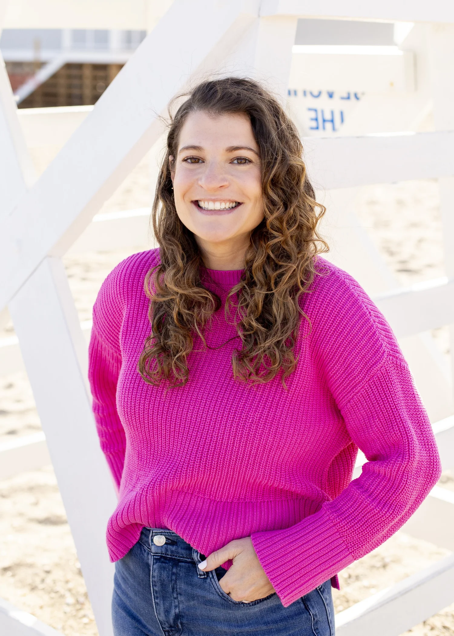 Zoe Carona, LCSW, smiling on the beach