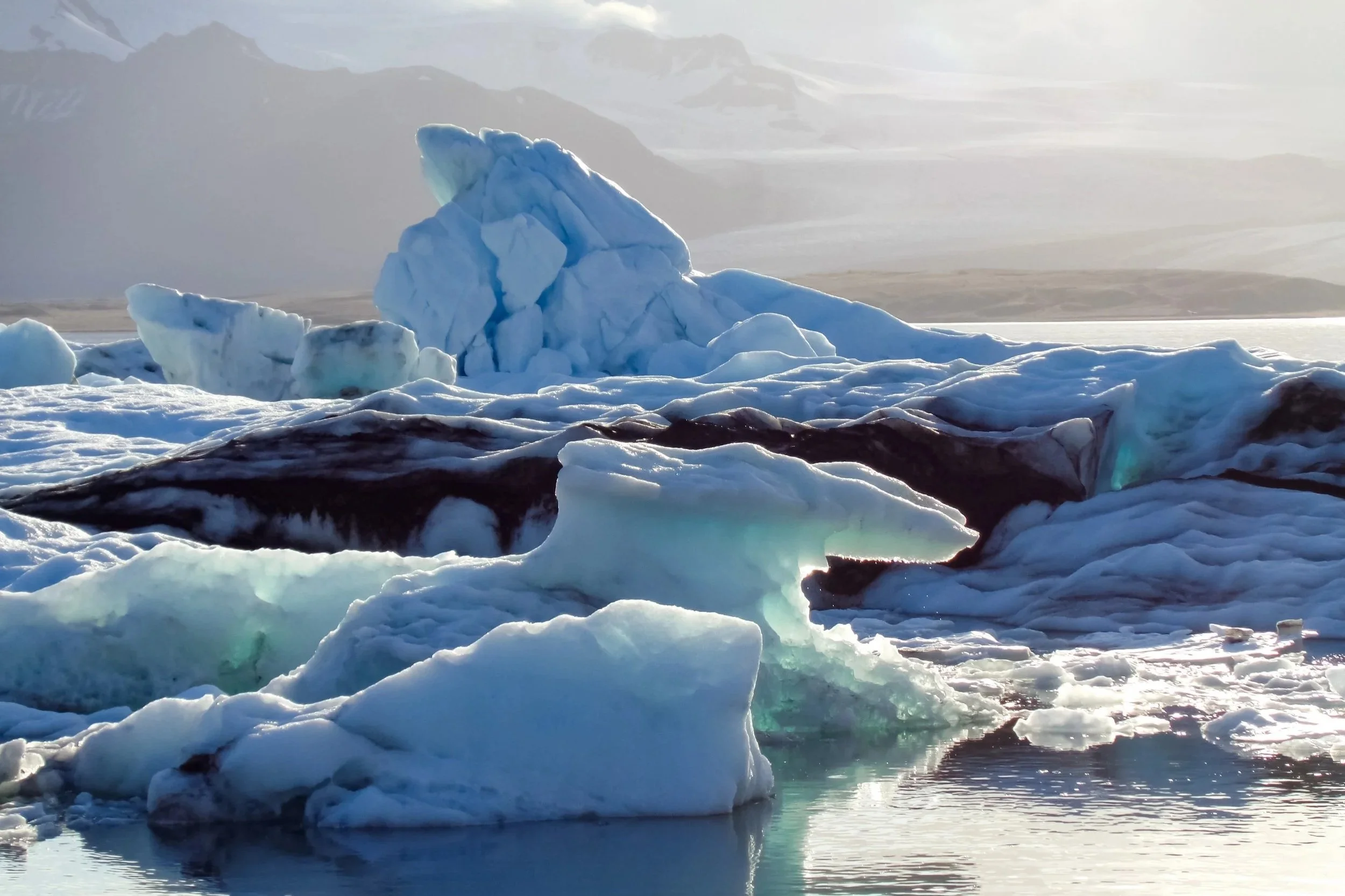 Blue icebergs floating in the water of Jökulsárlón glacier lagoon in Iceland