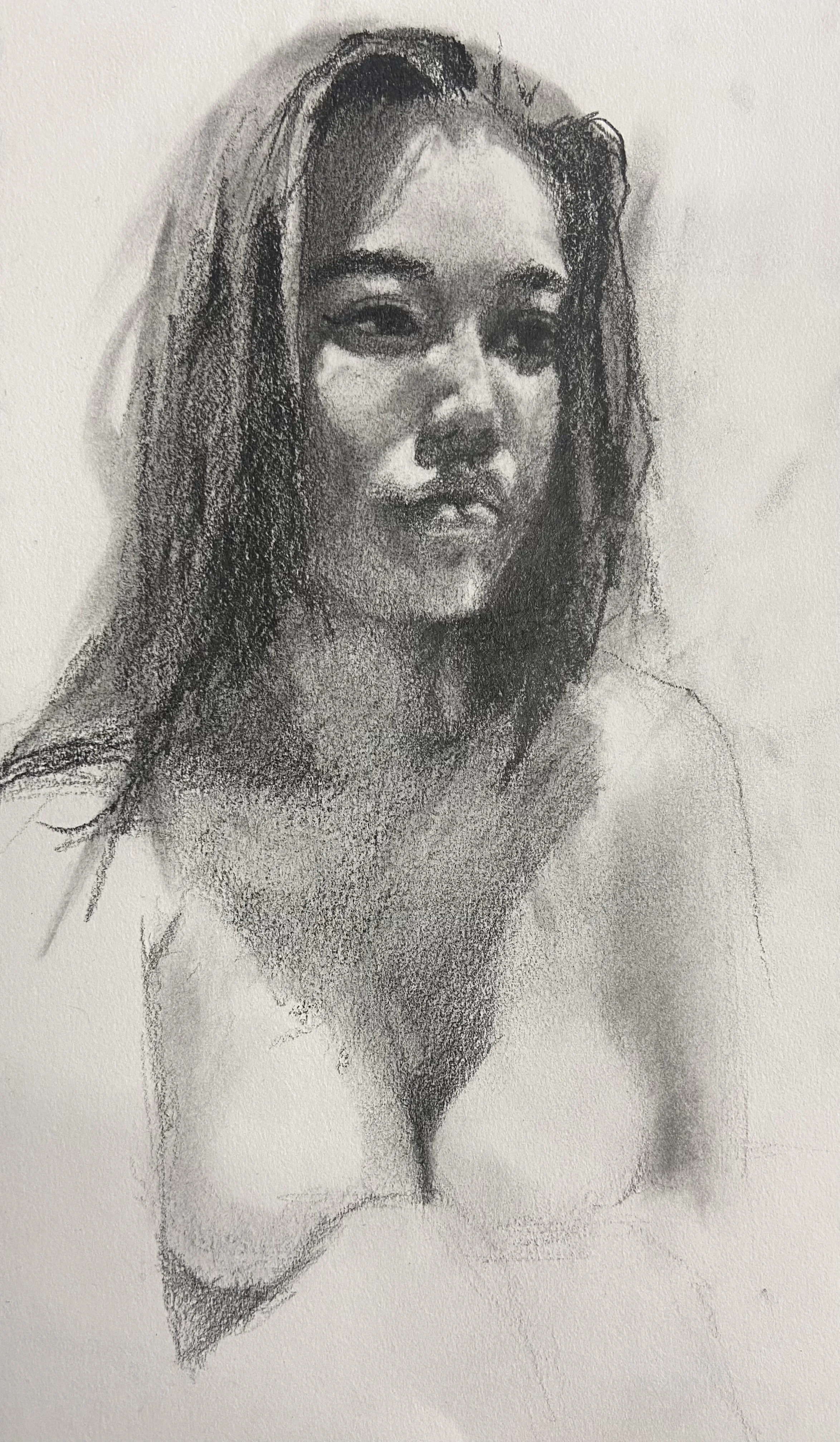 A pencil sketch of a woman with long hair, looking at the viewer, with a serious expression.