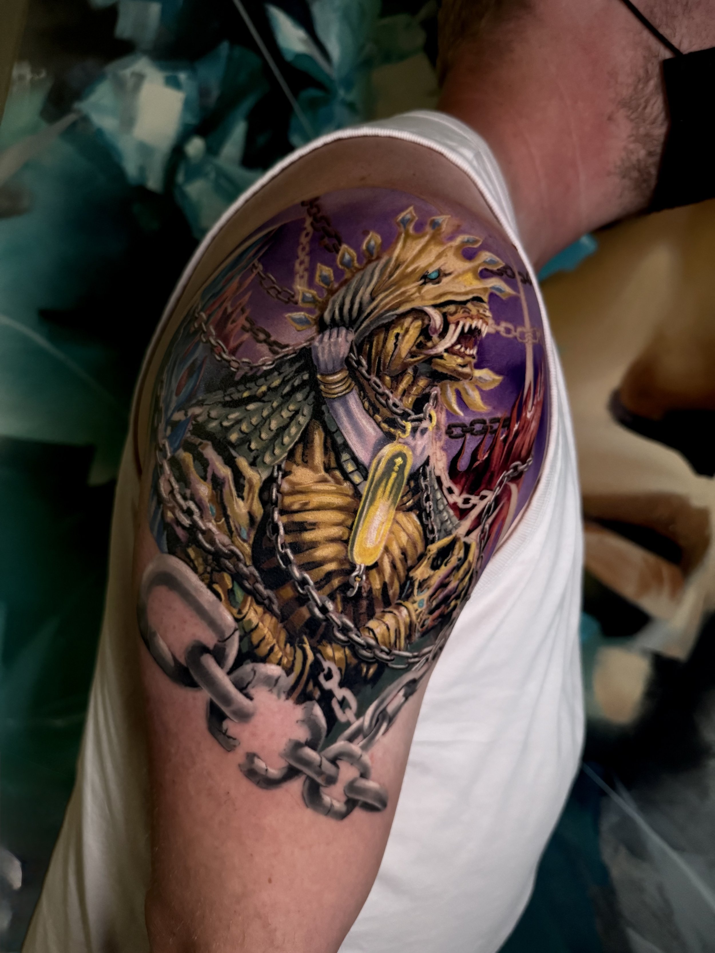 Full color range of Anima from Final Fantasy with chains on a person's upper arm.