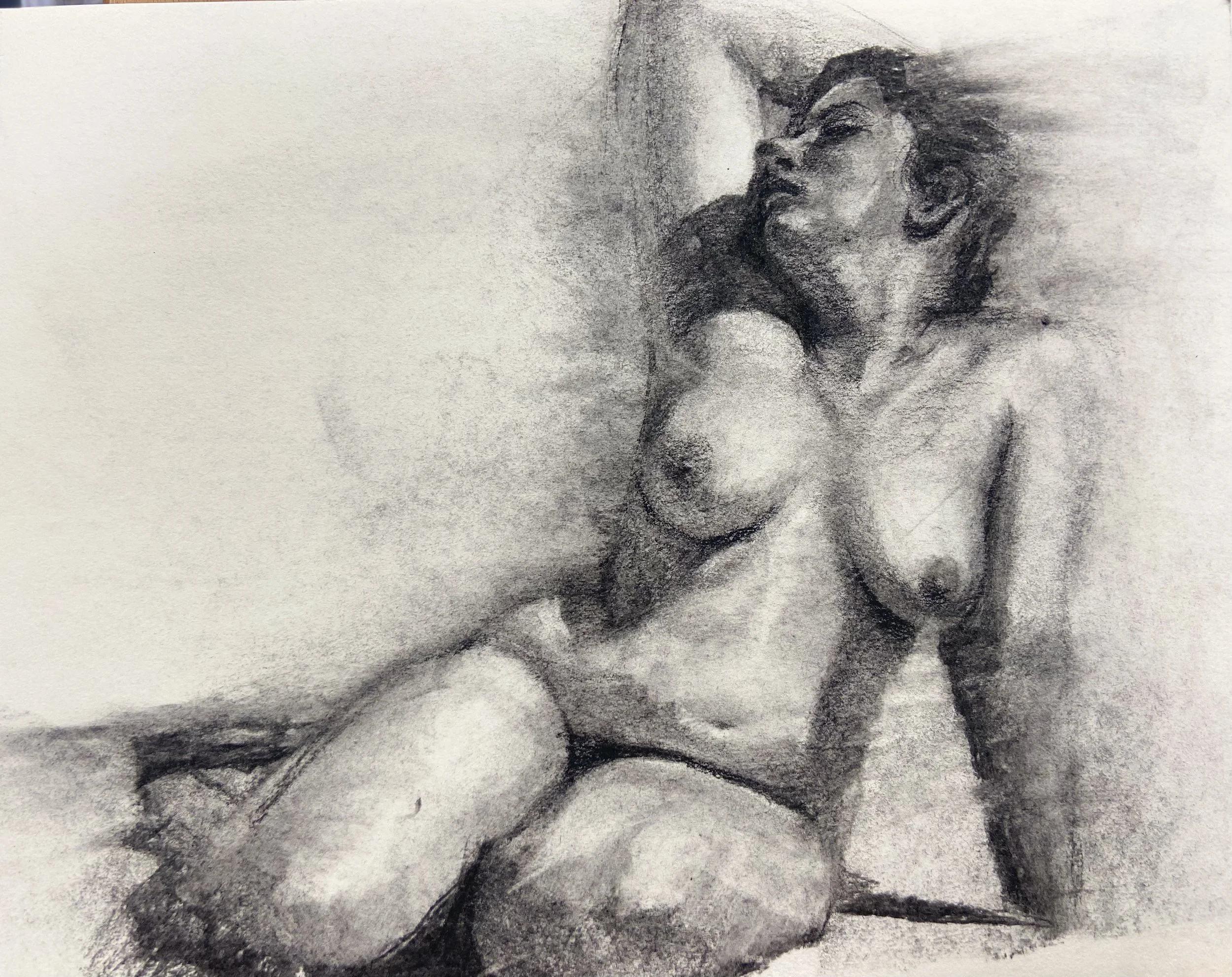 A pencil sketch of a woman with her eyes closed, head tilted back, and hair flowing, in a realistic art style.