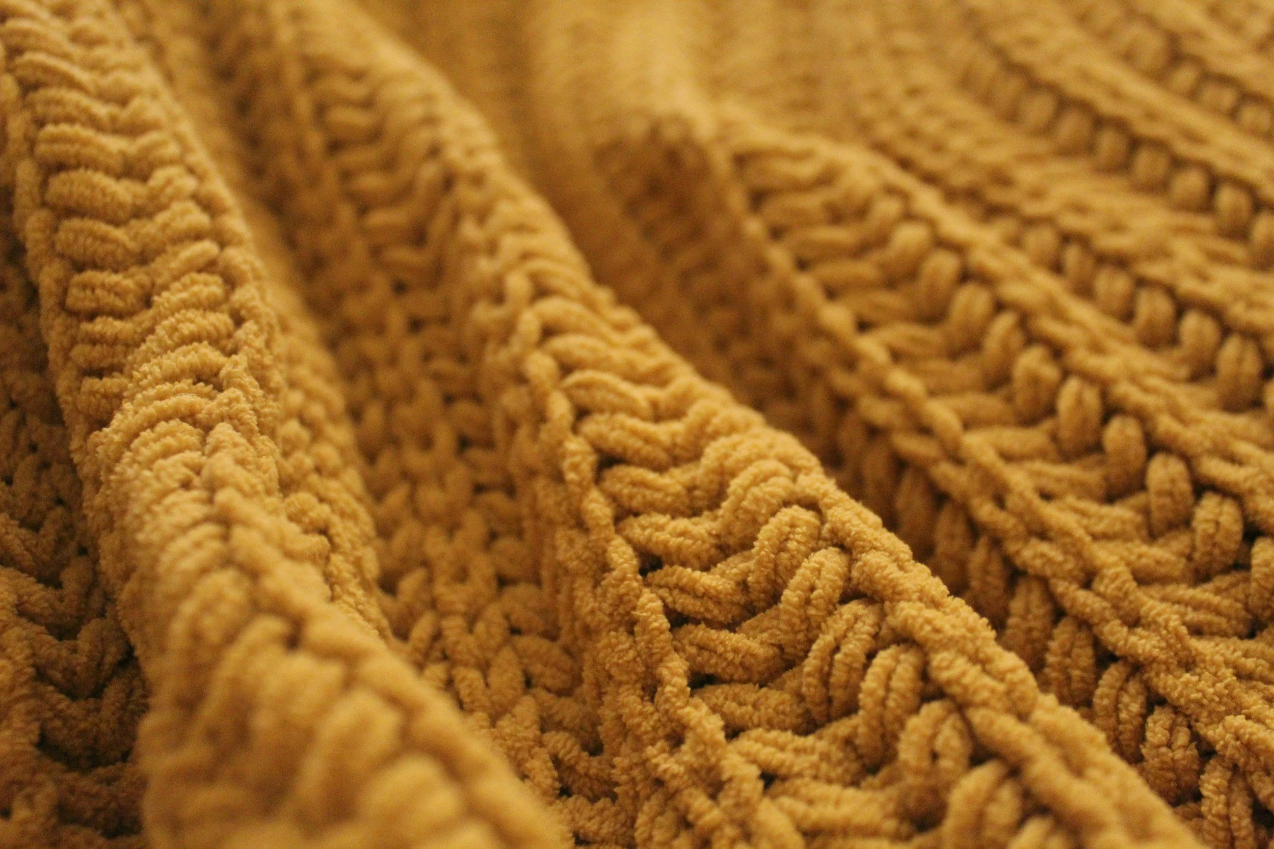A yellow knit blanket