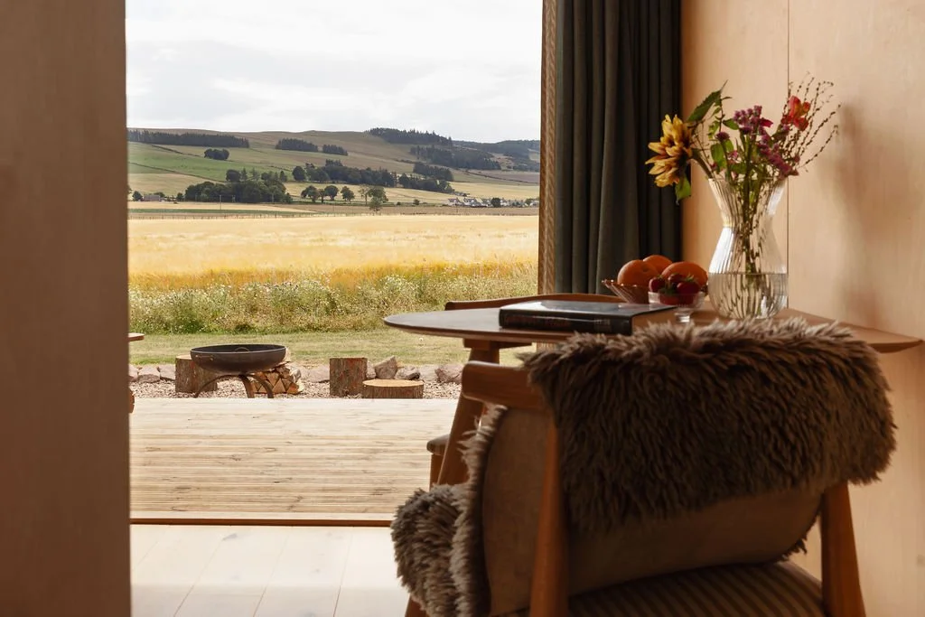 Table with doors open looking out to view