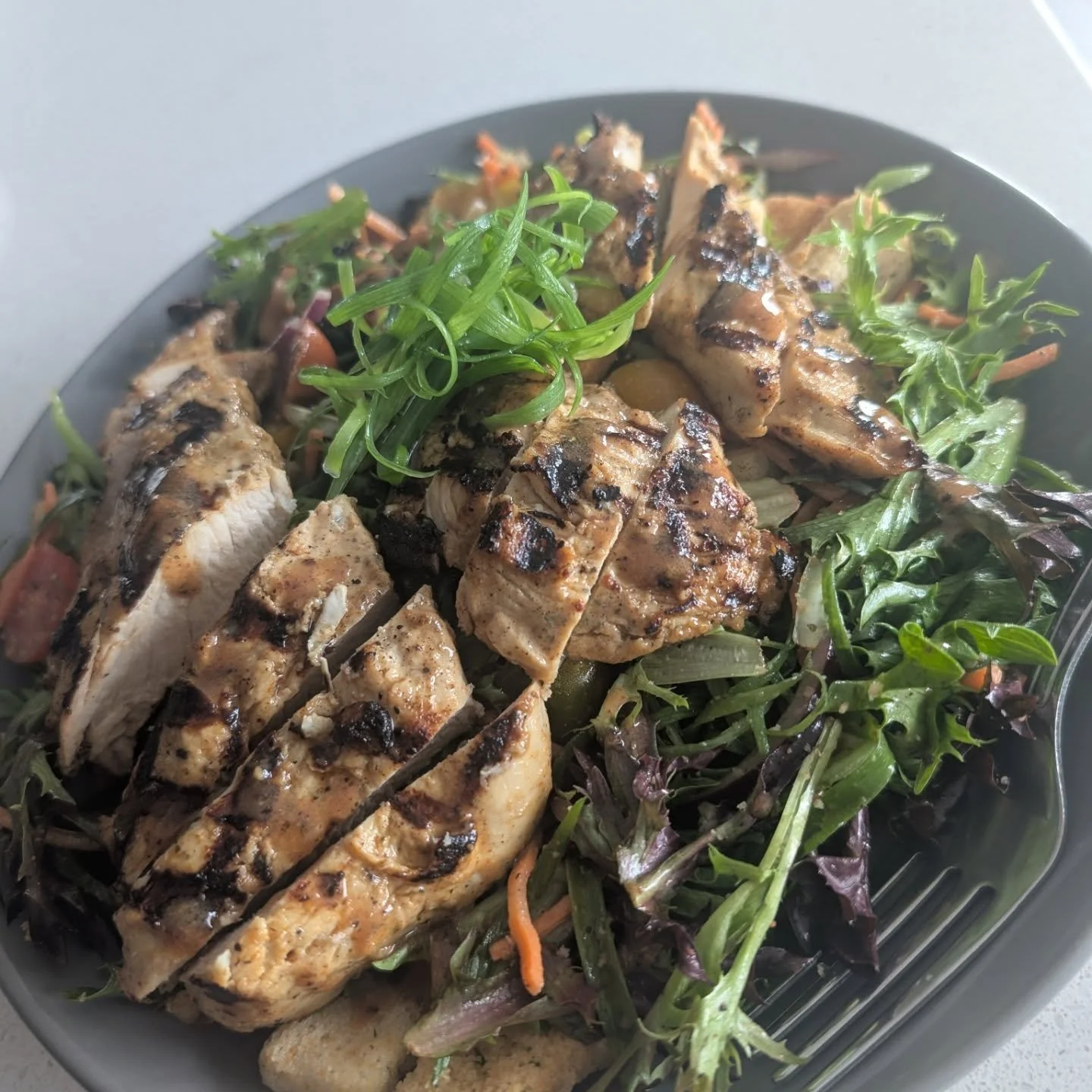 Summer Salad. Tomatoes. Carrots. Onions. Scallion Curls. Mediterranean Grilled Chicken. Sumac Vinaigrette. Recipe Down Below. 

2 Tbsp Spicy Mustard. 
2 Tbsp Honey. 
1/4 cup Red Wine Vinegar. 
1 Tbsp Each: Salt, Pepper, Garlic Powder. Paprika.
3 Tbsp