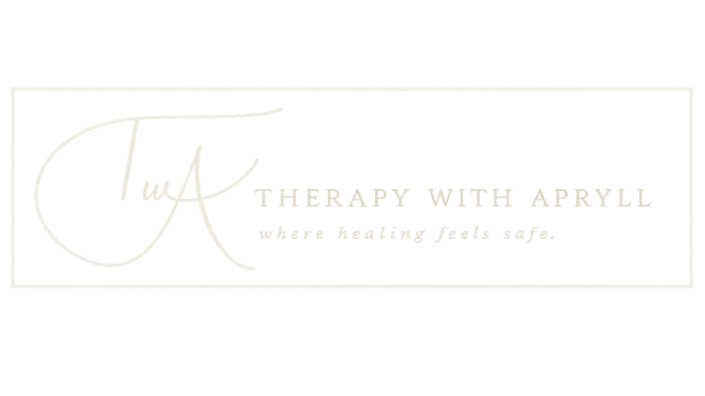 A white sign with the words 'Therapy with Apryll' in capital letters and 'Where Healing Feels Safe' is written below in smaller font.