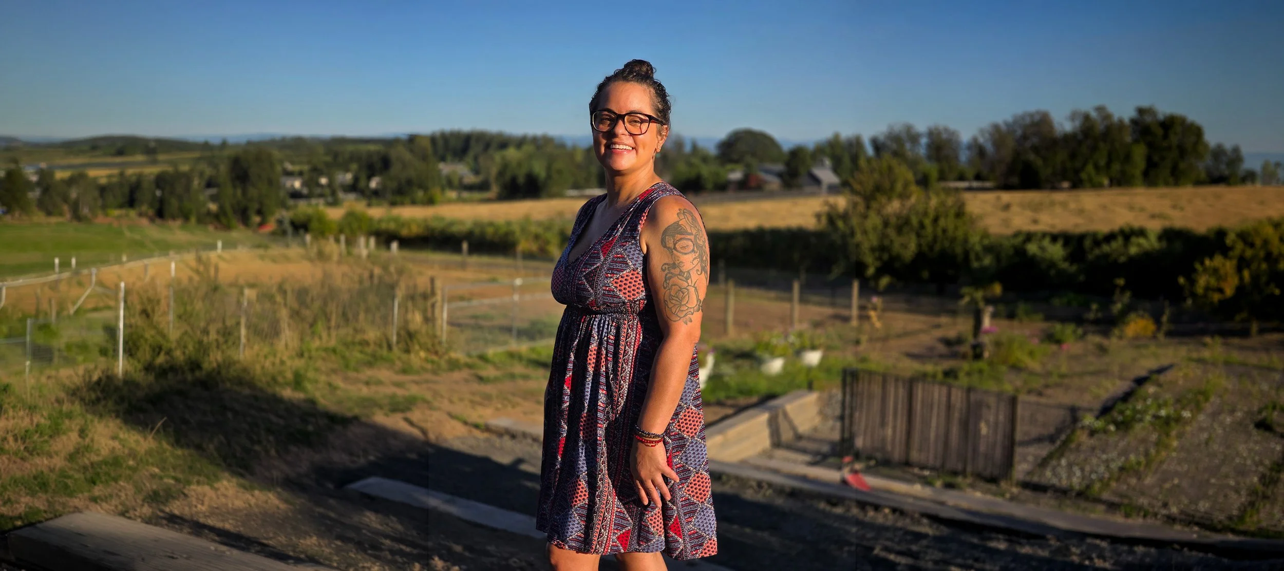 Melissa Mansour against a scenic outdoor backdrop in West Linn Oregon