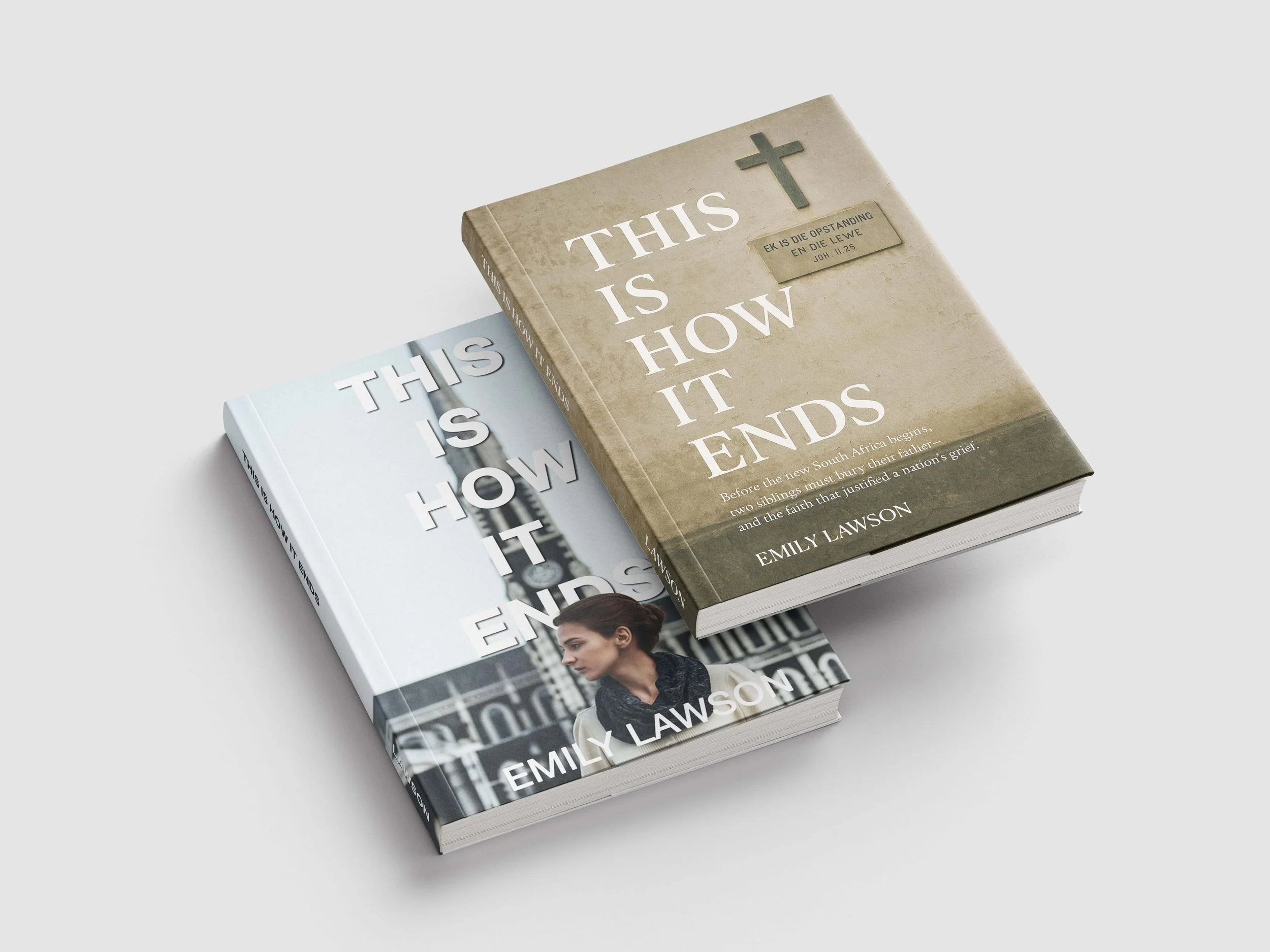 Two copies of the book titled "This Is How It Ends" by Emily Lawson, one with a beige cover featuring a cross and a Bible verse, and the other with a black and white cover showing a woman in profile, both placed on a white surface.